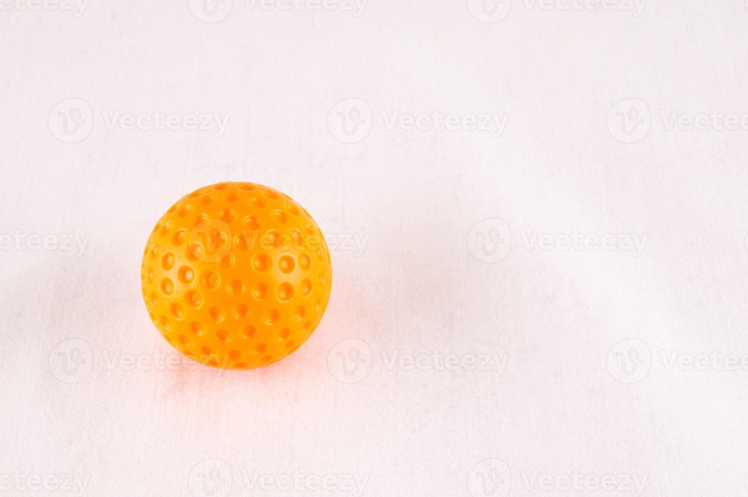 Yello ball on white background photo