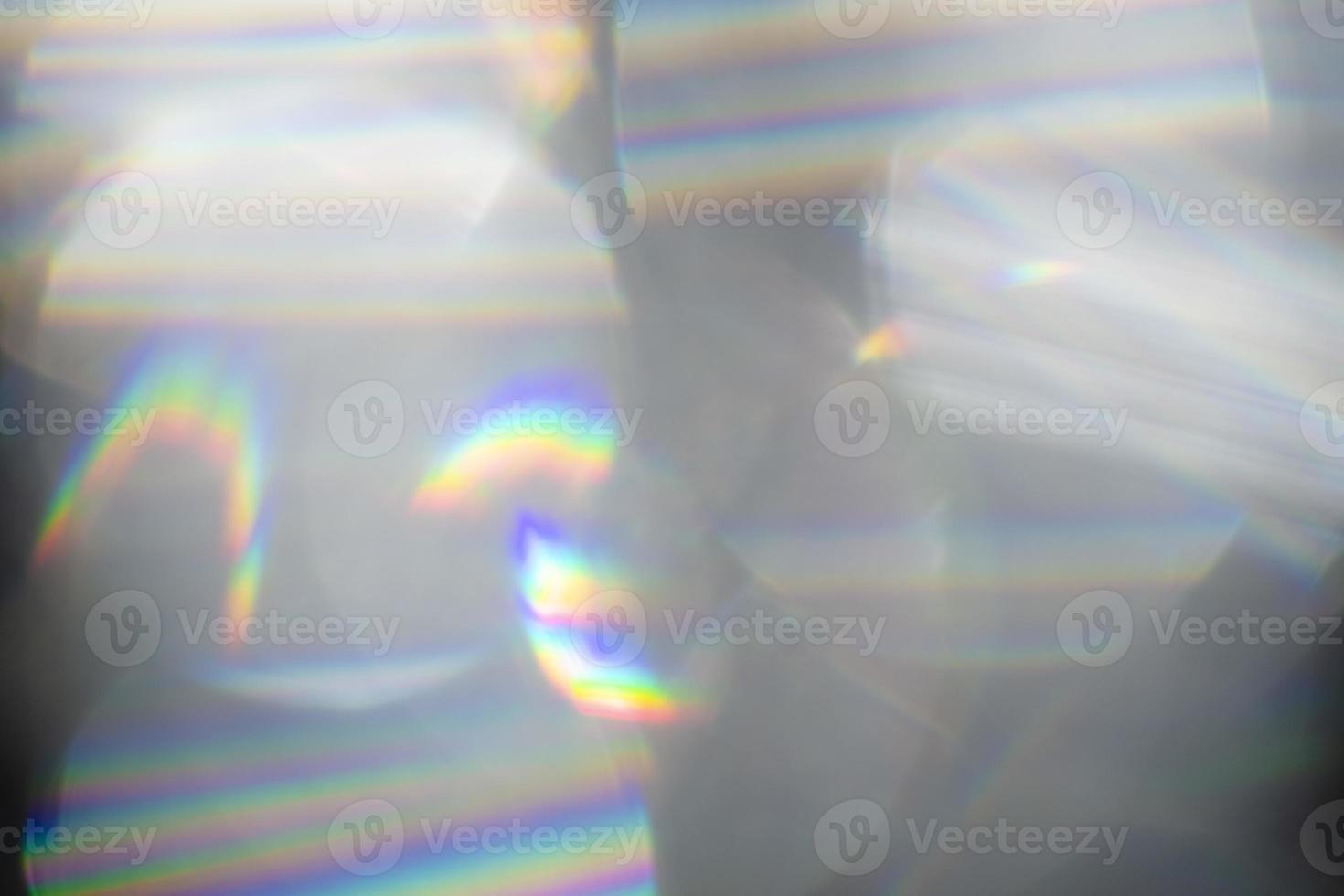Rainbow Lens. Optical glare effect of objective lenses. Defocused blur reflection of rainbow sunbeams. photo