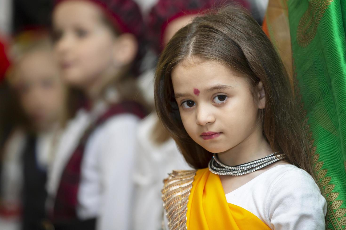 Belarus, city of Gomil, May 21, 2021. People's Friendship Day.Little Indian girl in national dress. photo