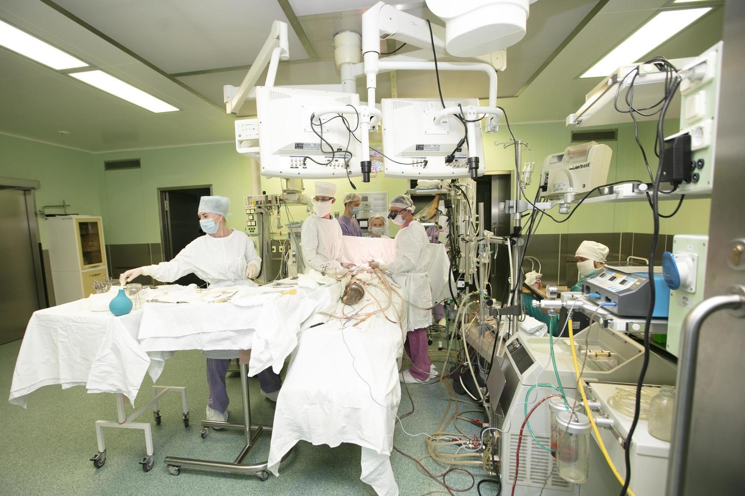 Belarus, city of Gomil., May 31, 2021. City Hospital. Surgical operating room in a hospital with doctors who perform surgery on a man. photo