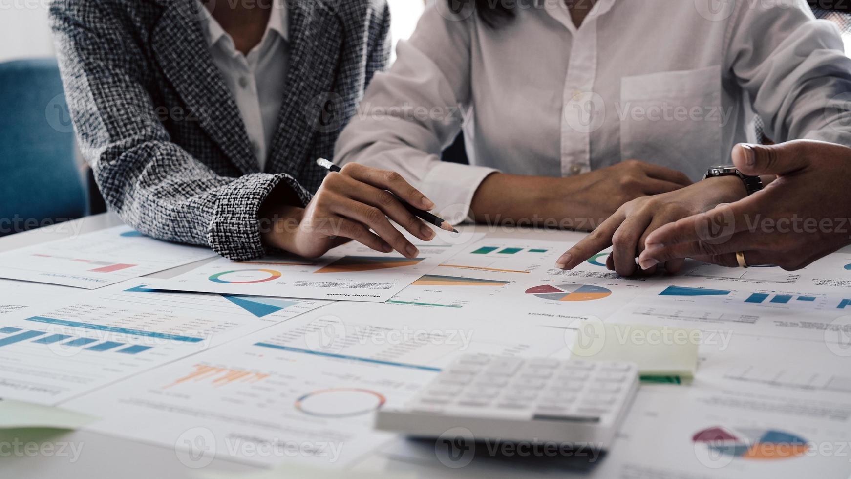 Teamwork process, business people working in the office discussing documents and ideas at meeting. financial accounting concept photo