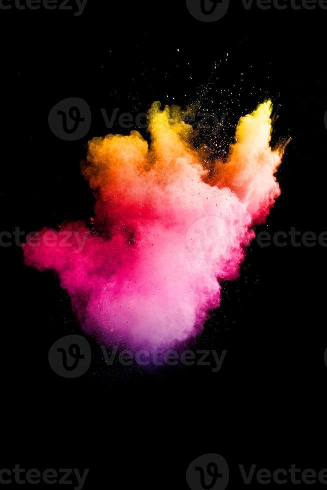 Pink yellow powder splash on white background,Freeze motion of color powder exploding. photo