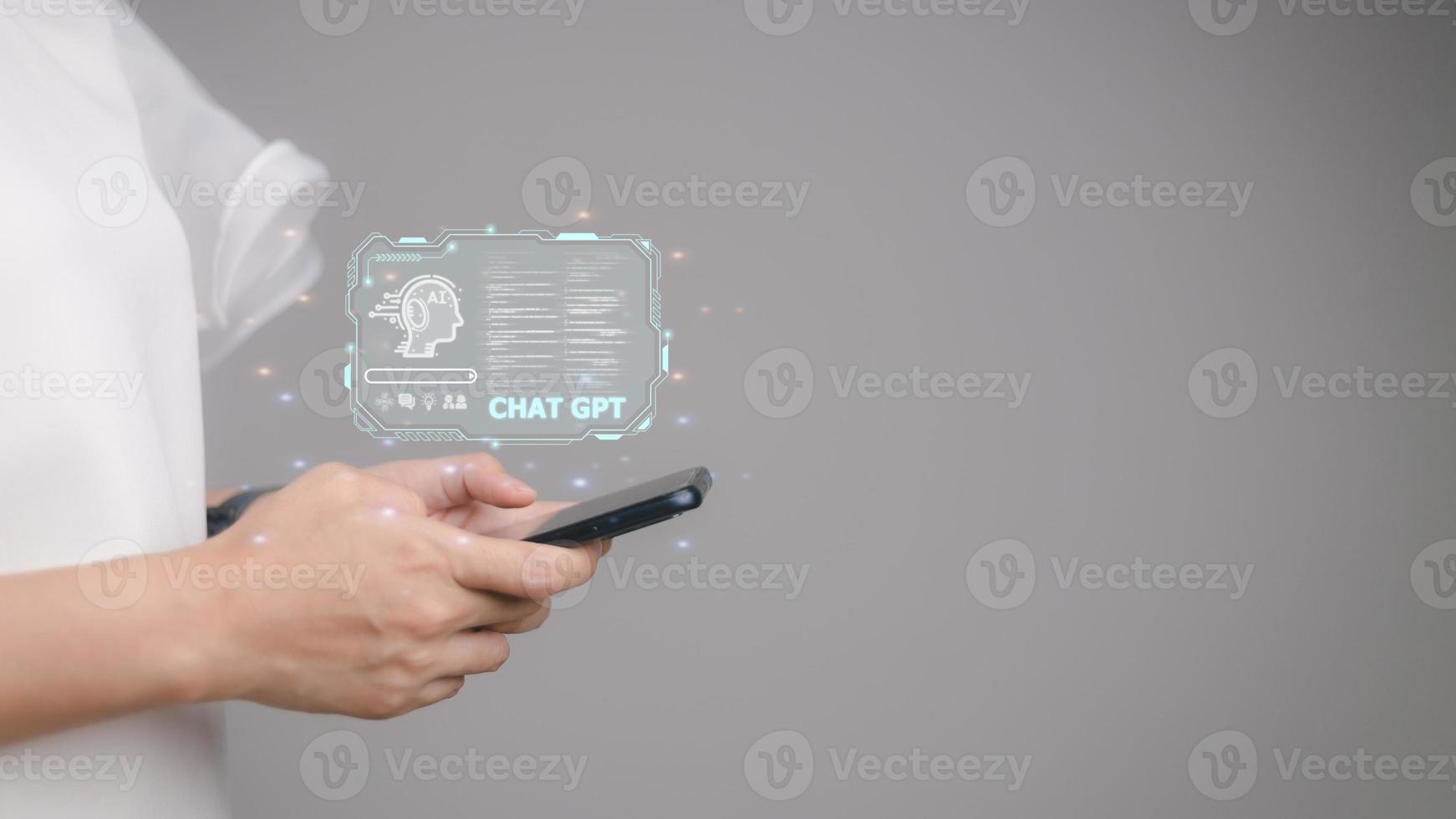 ChatGPT Chat with AI or Artificial Intelligence. Business chatting with a smart AI or artificial intelligence using an artificial intelligence chatbot developed by OpenAI. photo