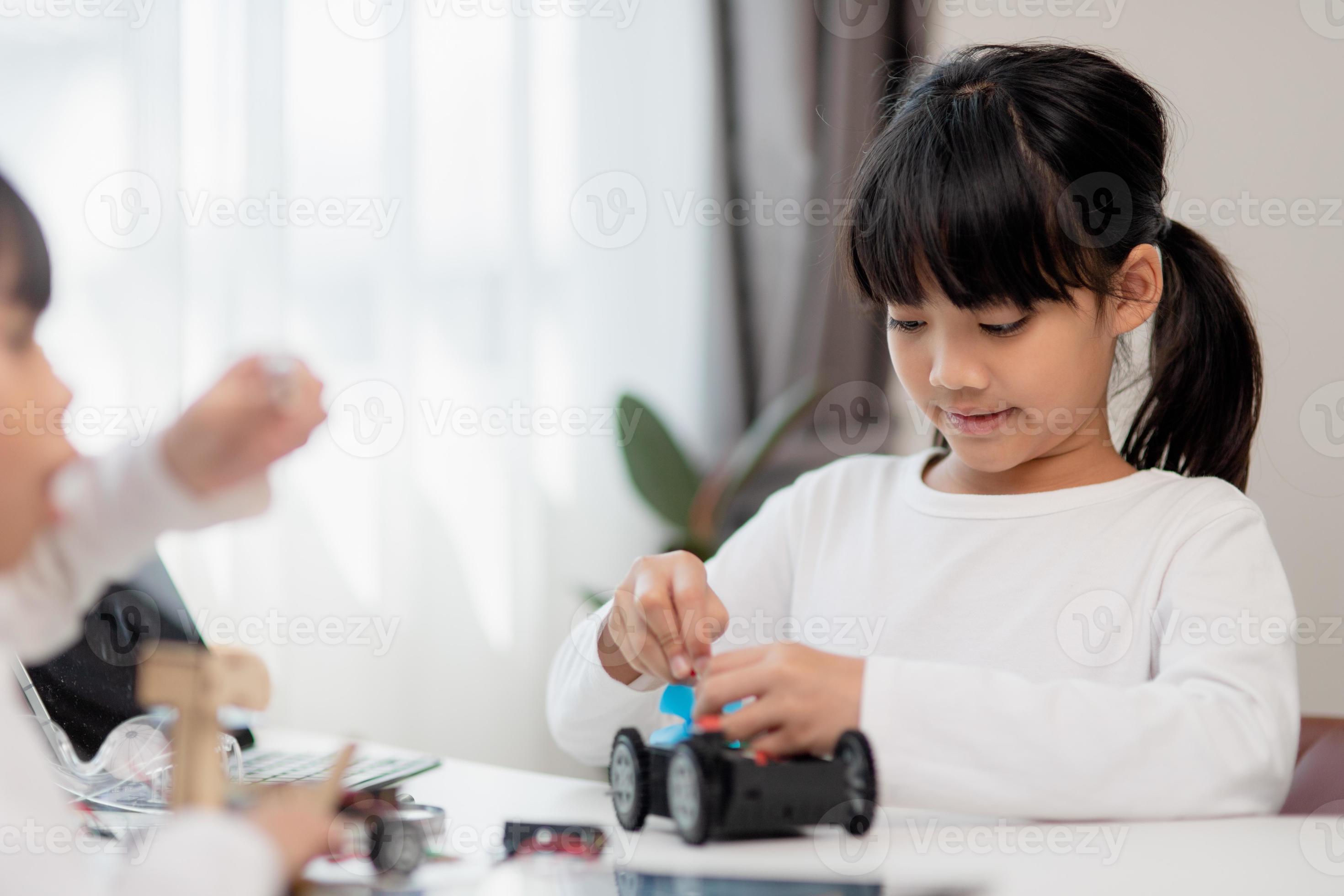 Asia students learn at home in coding robot cars and electronic board ...