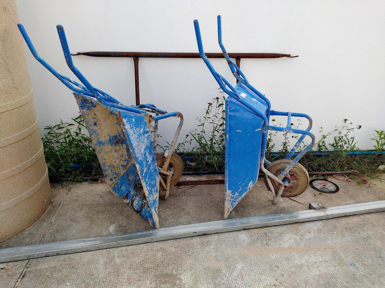 Blue metal construction cart at a construction site. photo