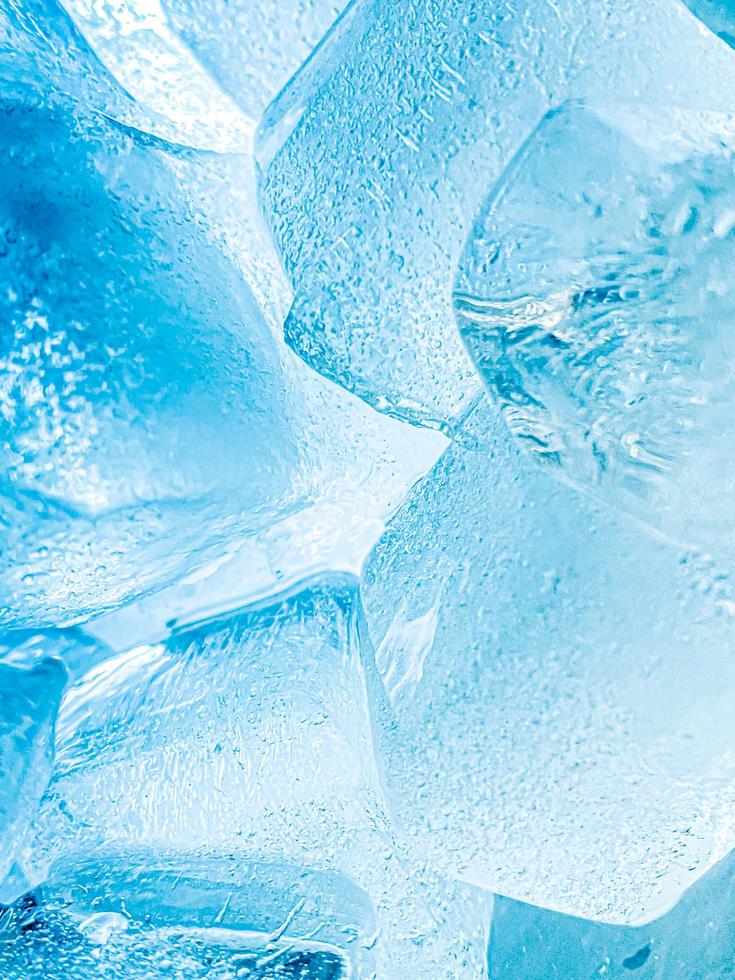 Ice cubes background, ice cube texture or background It makes me feel fresh and feel good, In the summer, ice and cold drinks will make us feel relaxed, Made for beverage or refreshment business. photo