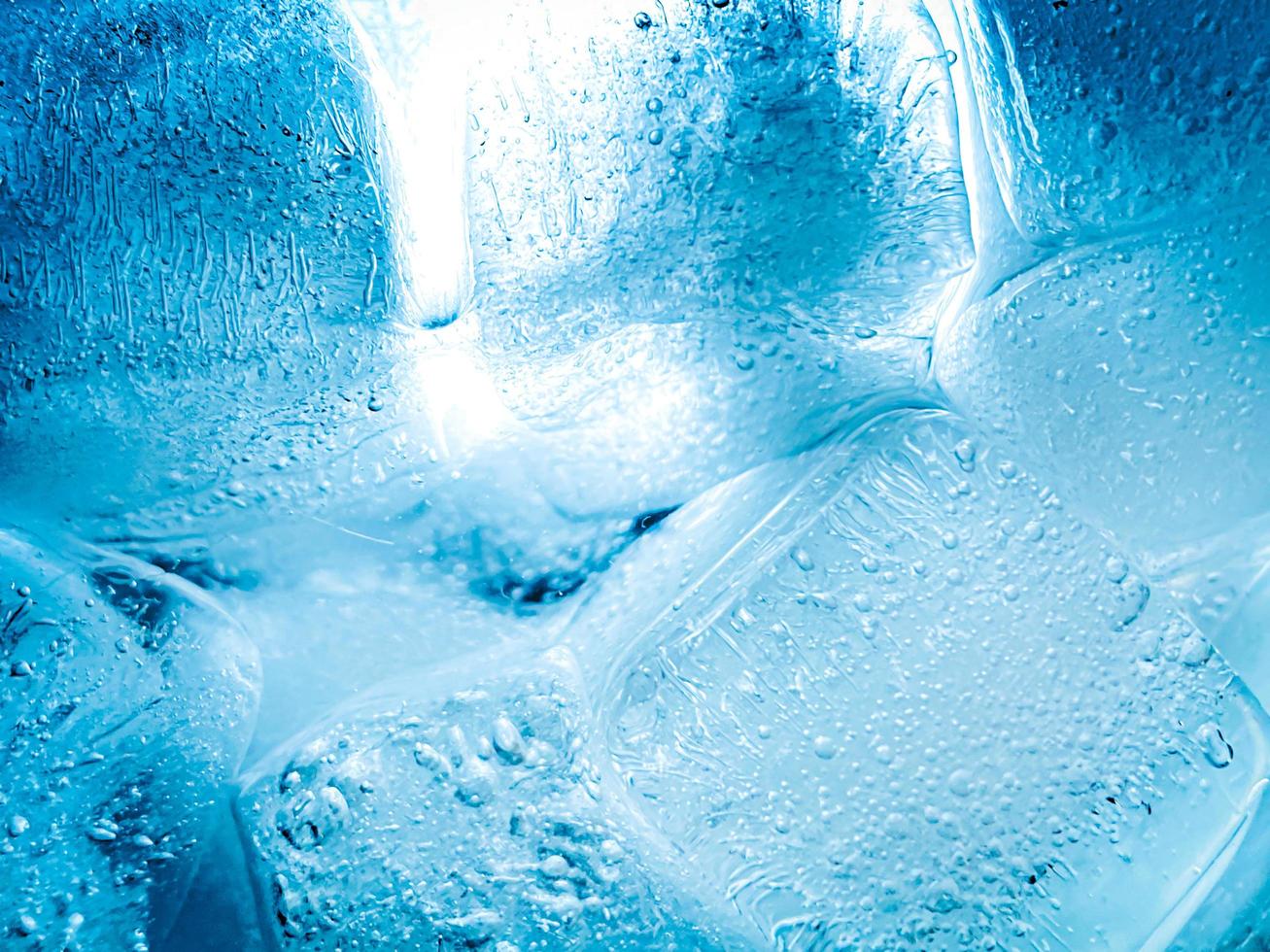 Ice cubes background, ice cube texture or background It makes me feel fresh and feel good, In the summer, ice and cold drinks will make us feel relaxed, Made for beverage or refreshment business. photo