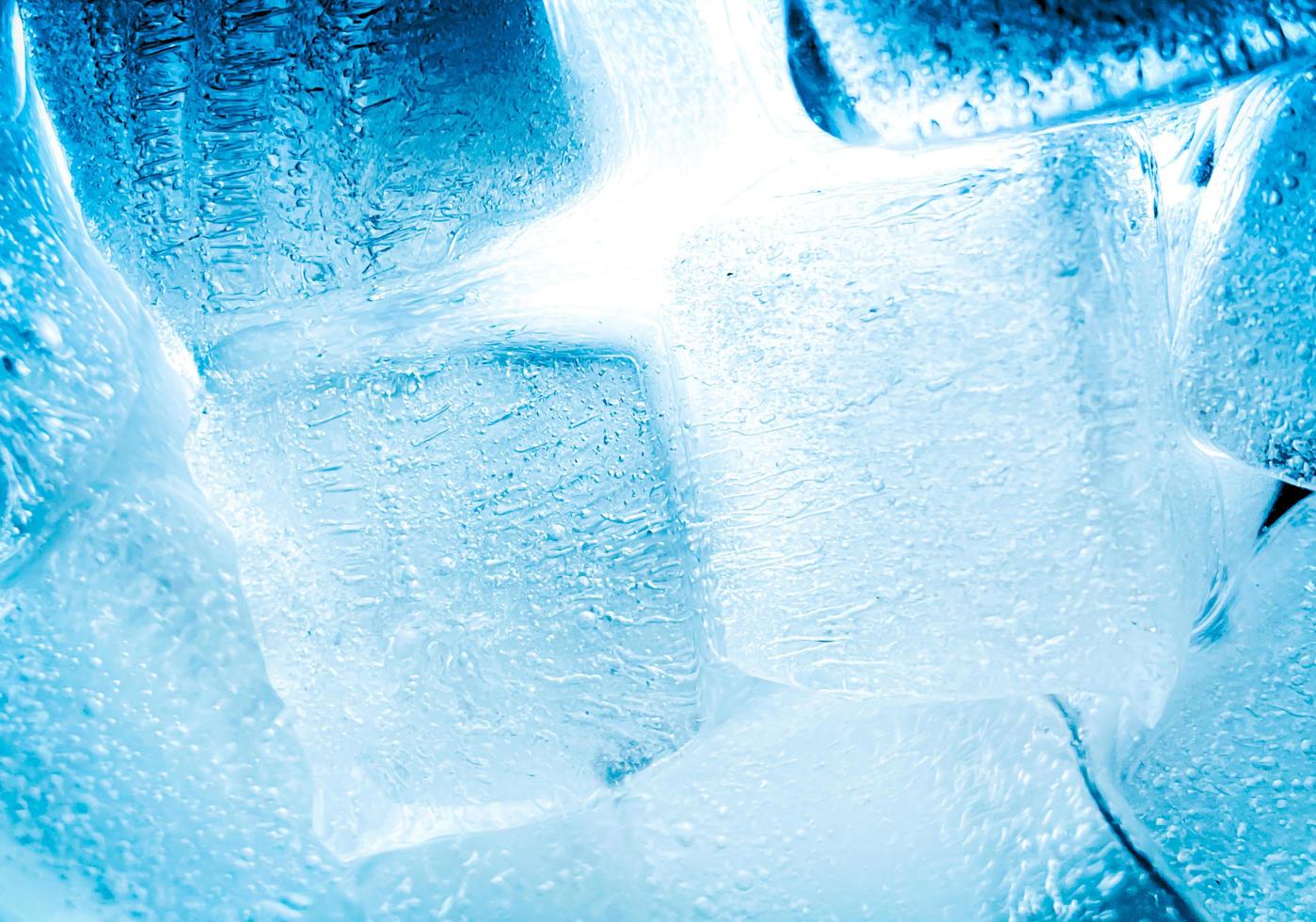 Ice cubes background, ice cube texture or background It makes me feel fresh and feel good, In the summer, ice and cold drinks will make us feel relaxed, Made for beverage or refreshment business. photo