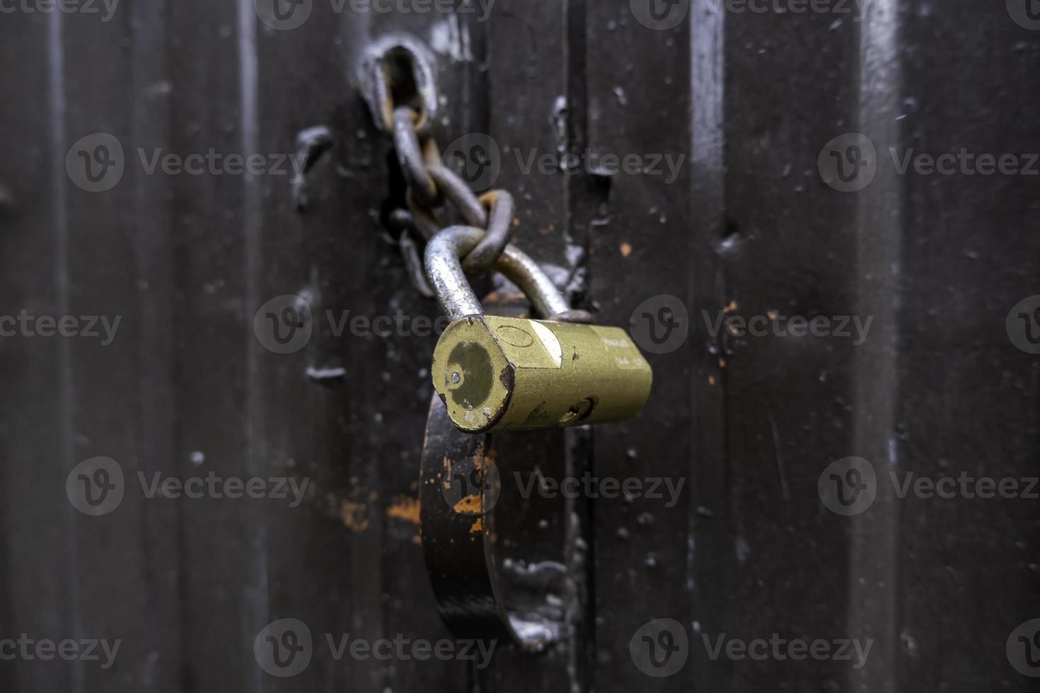 Old padlock on a door photo
