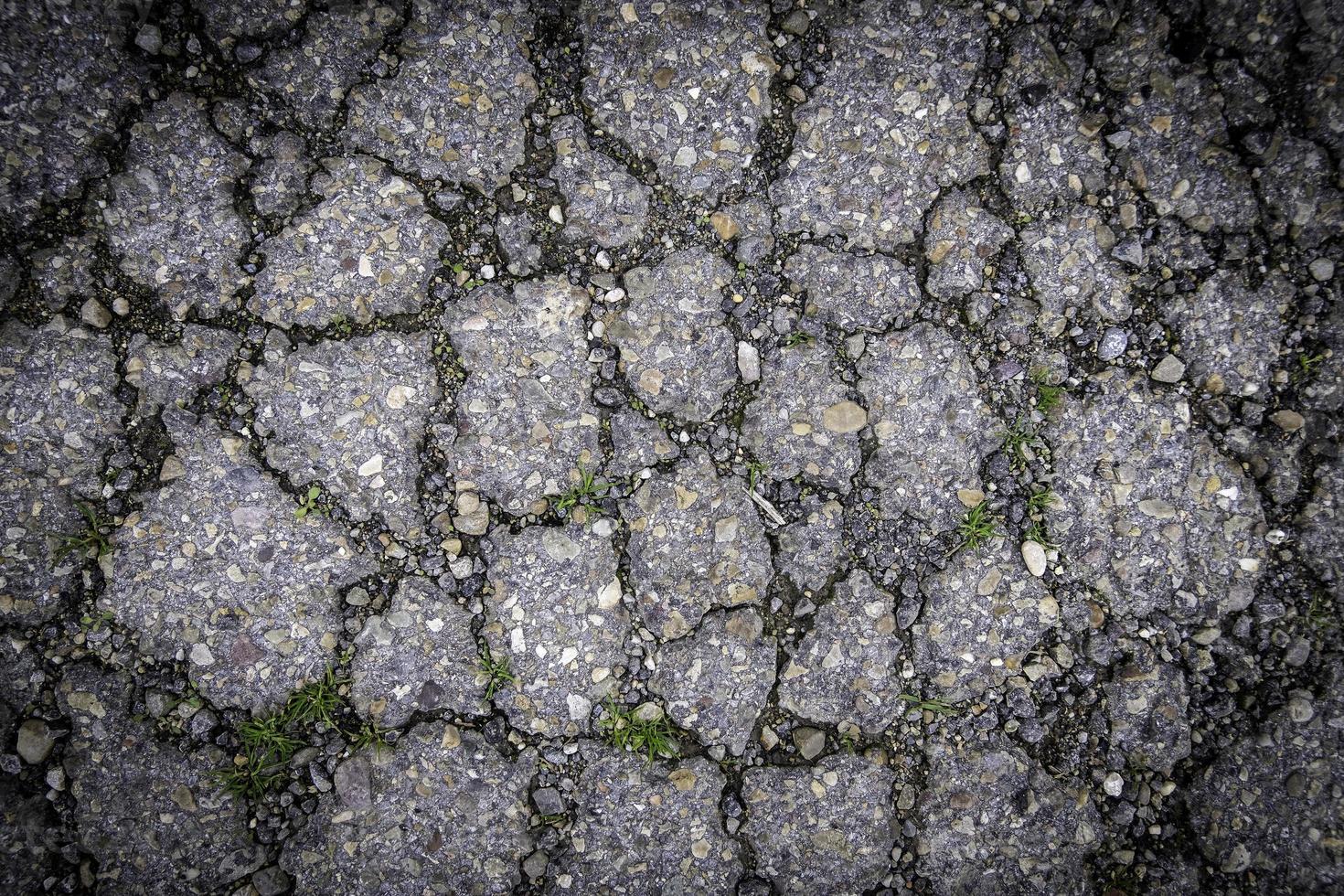 Cracked asphalt floor photo