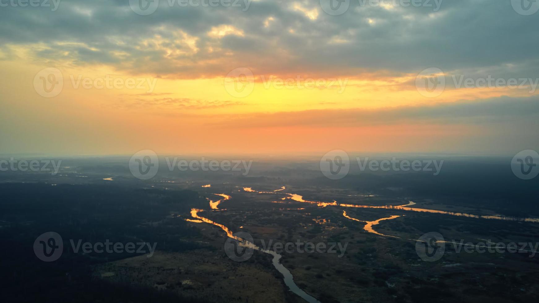 Sunrise over river. Aerial view photo