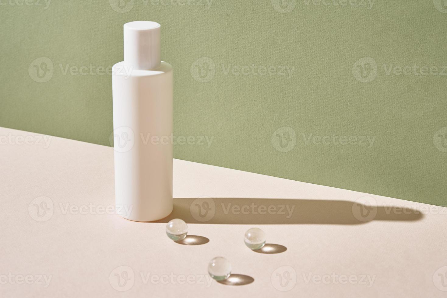 Cosmetics beauty mockup. White bottle on pastel background photo