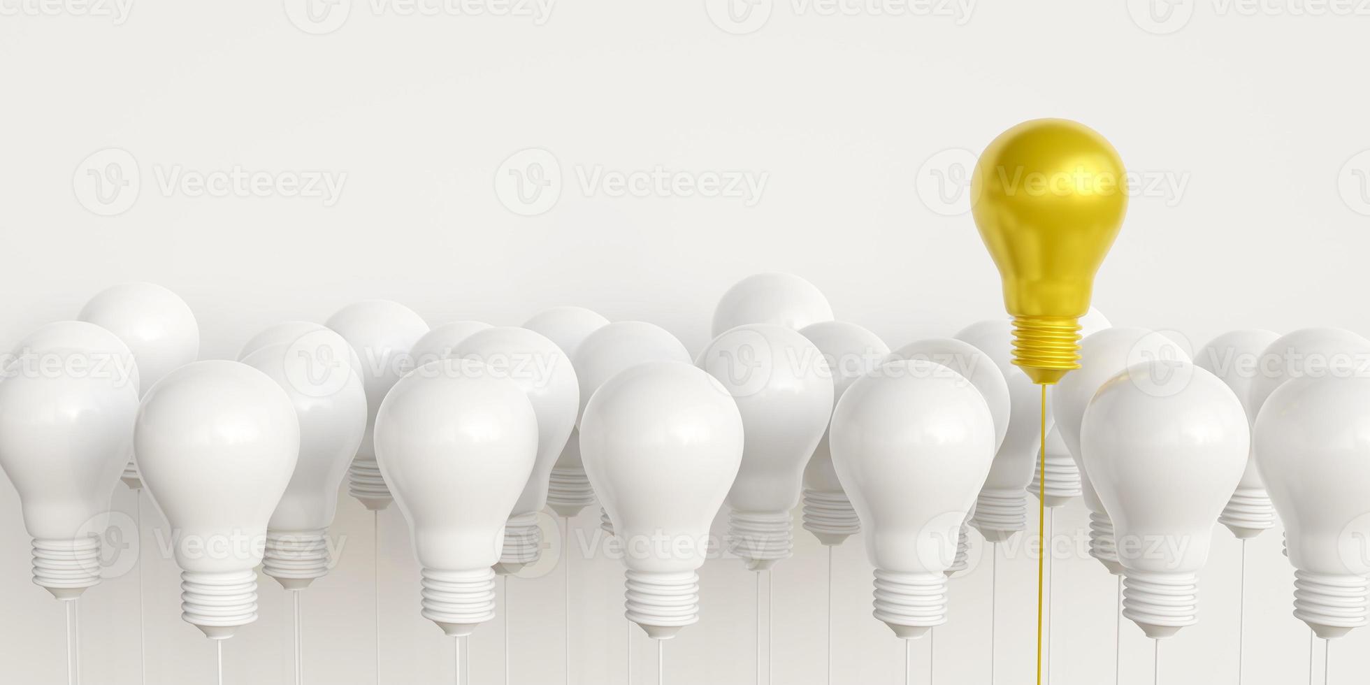 la distintiva bombilla de luz dorada flota sobre la bombilla de luz blanca. concepto de liderazgo talentoso e ideas sobresalientes, buenas ideas seleccionadas, innovación e inspiración. con copia foto