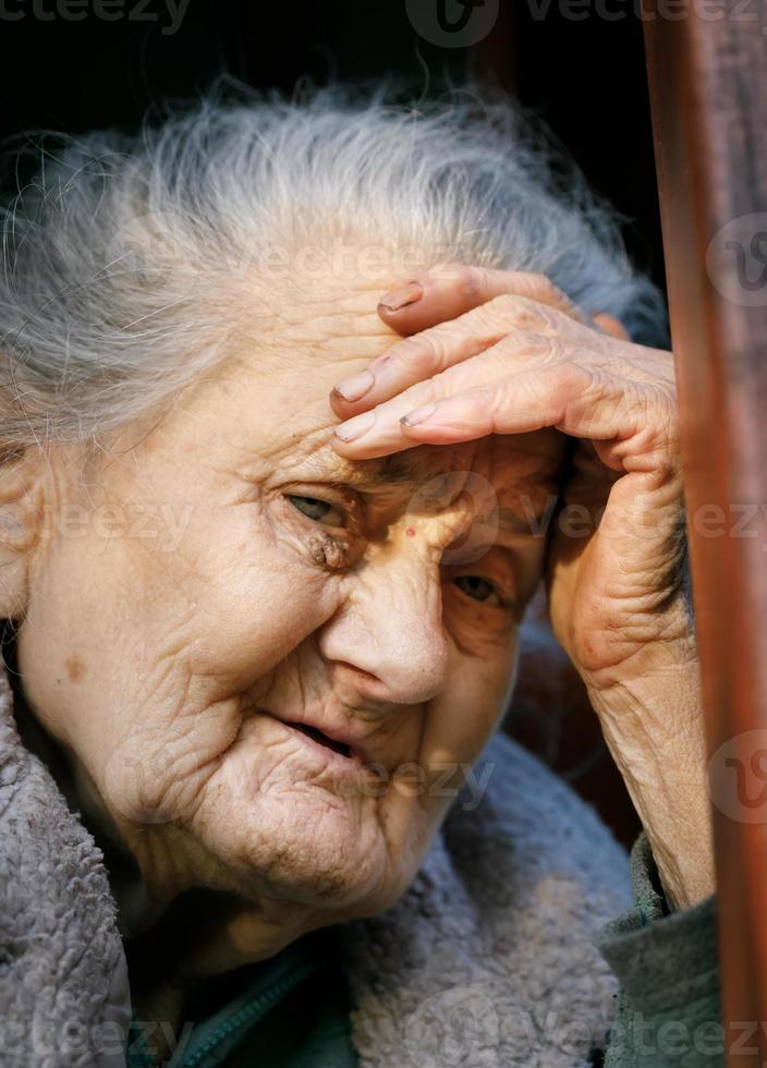Portrait of a very old wrinkled woman photo
