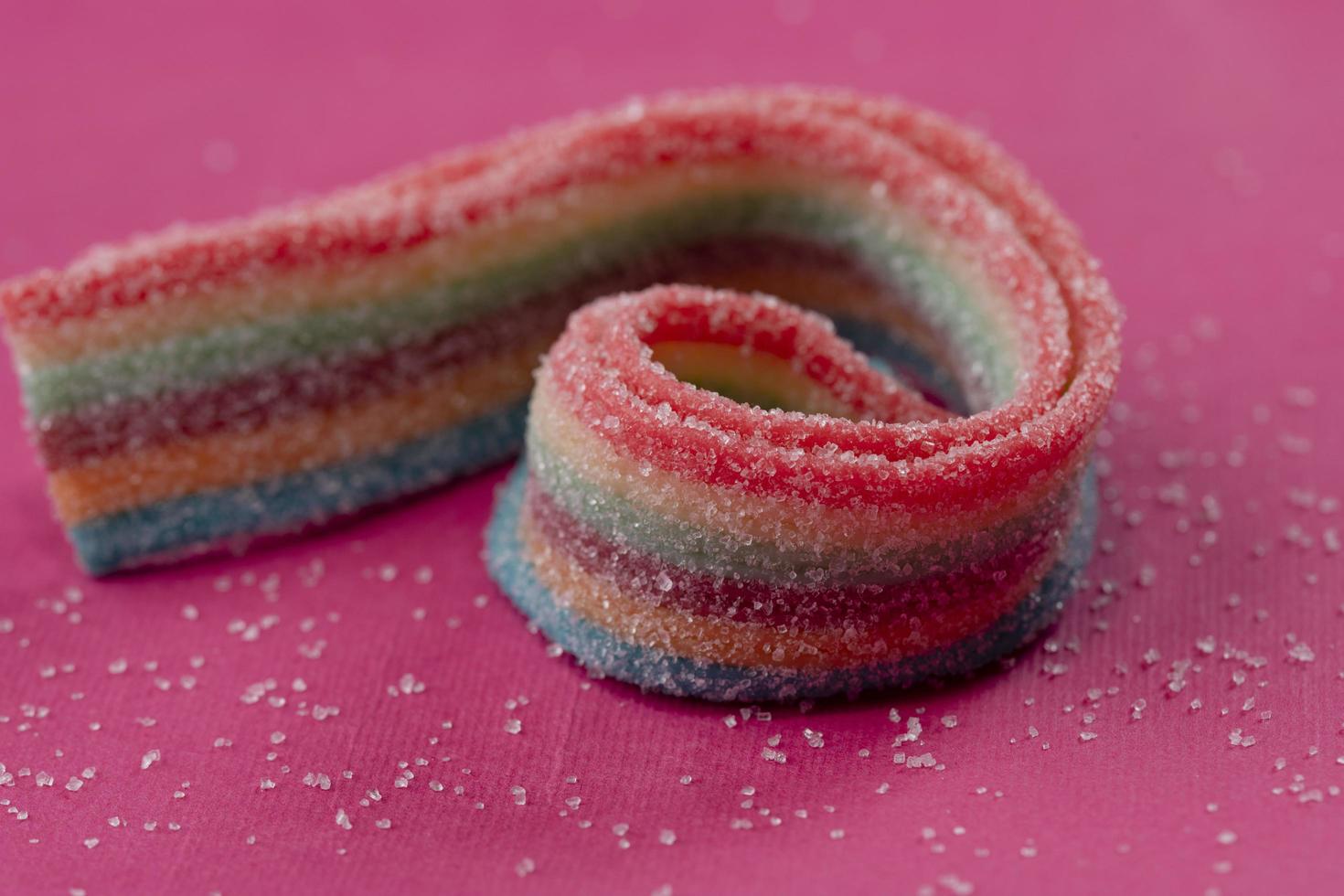 candies on pink background. Selective focus. photo