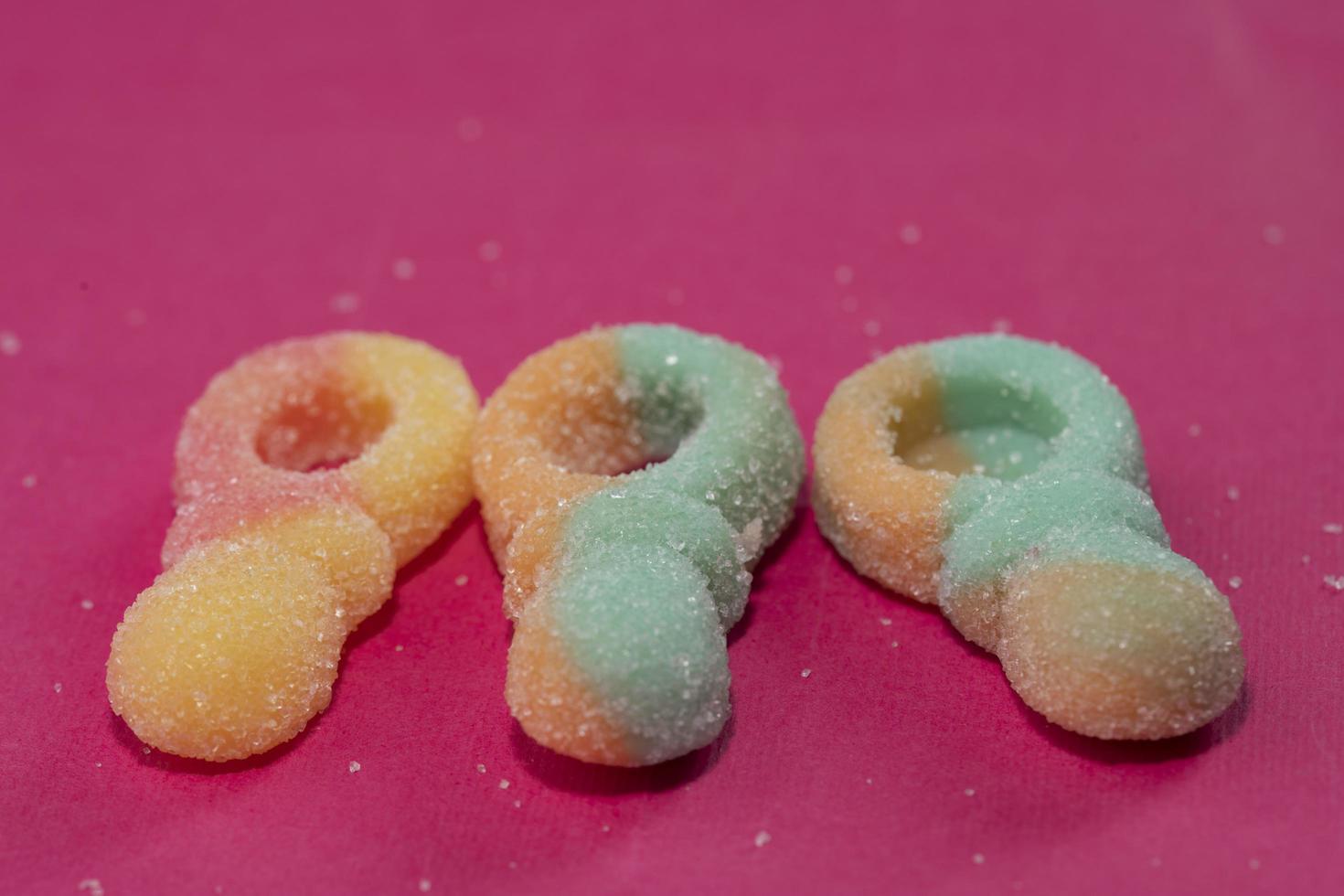 candies on pink background. Selective focus. photo