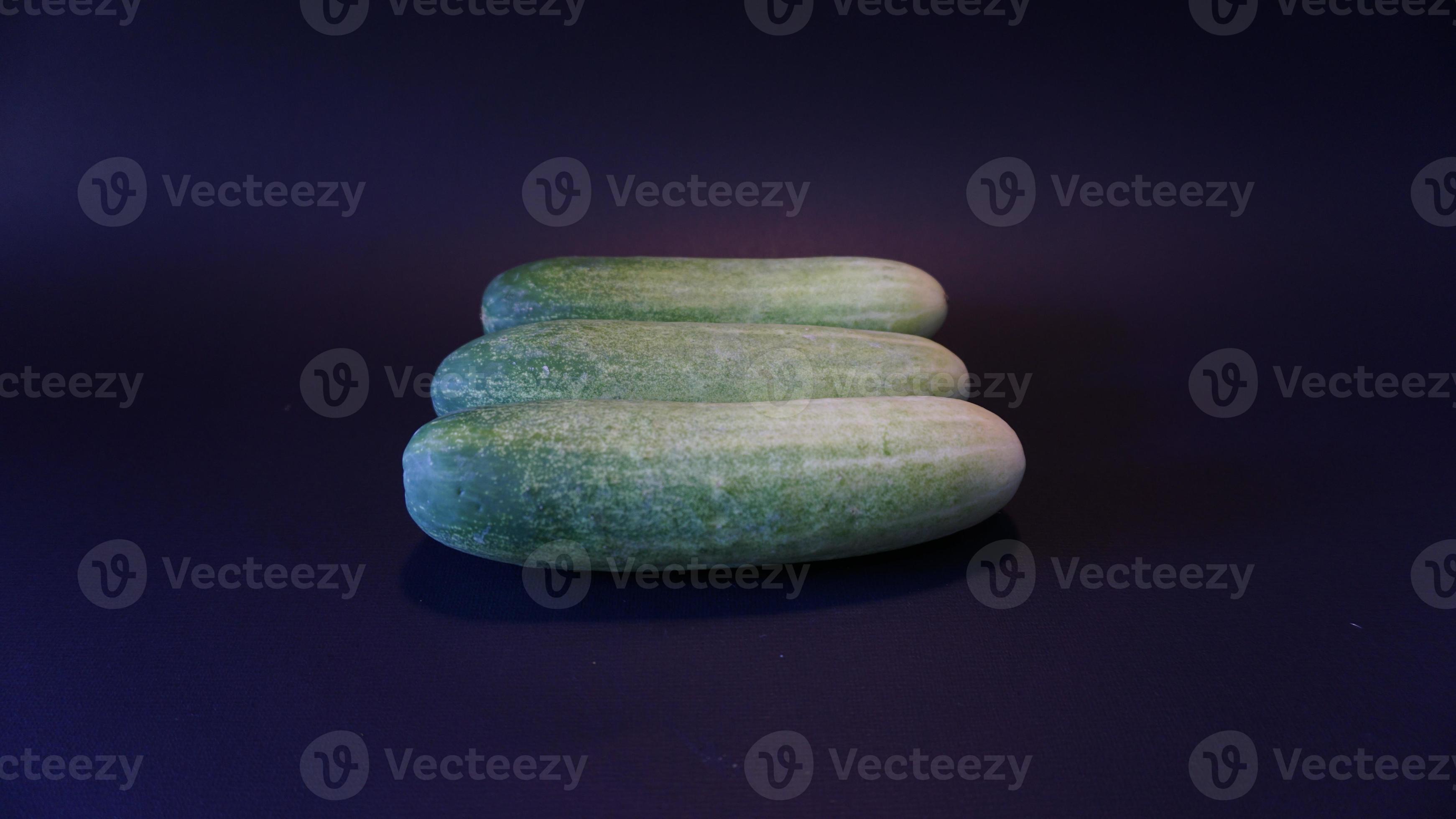 Fresh cucumber on black background. 18918563 Stock Photo at Vecteezy