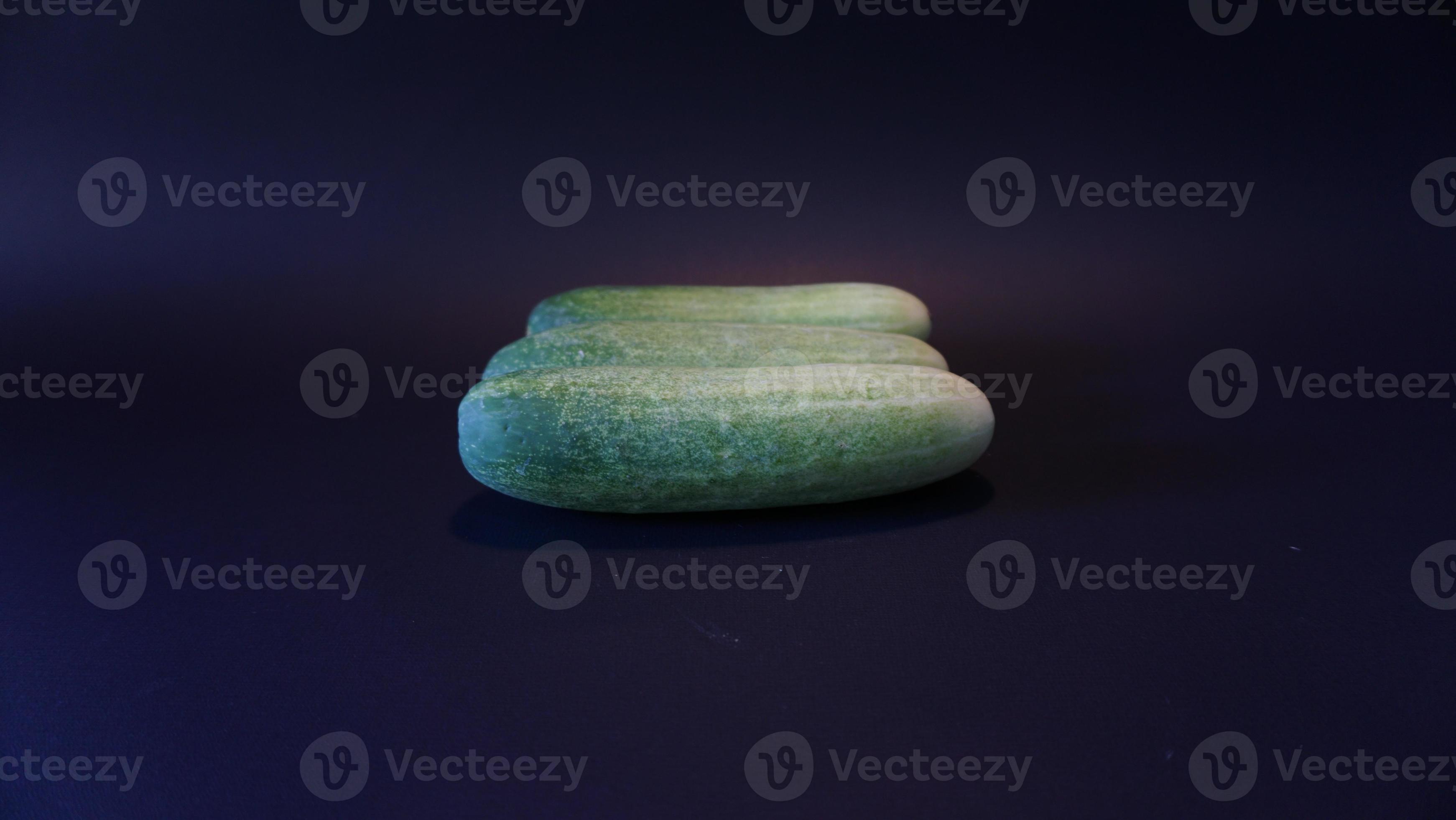 Fresh cucumber on black background. 18918565 Stock Photo at Vecteezy