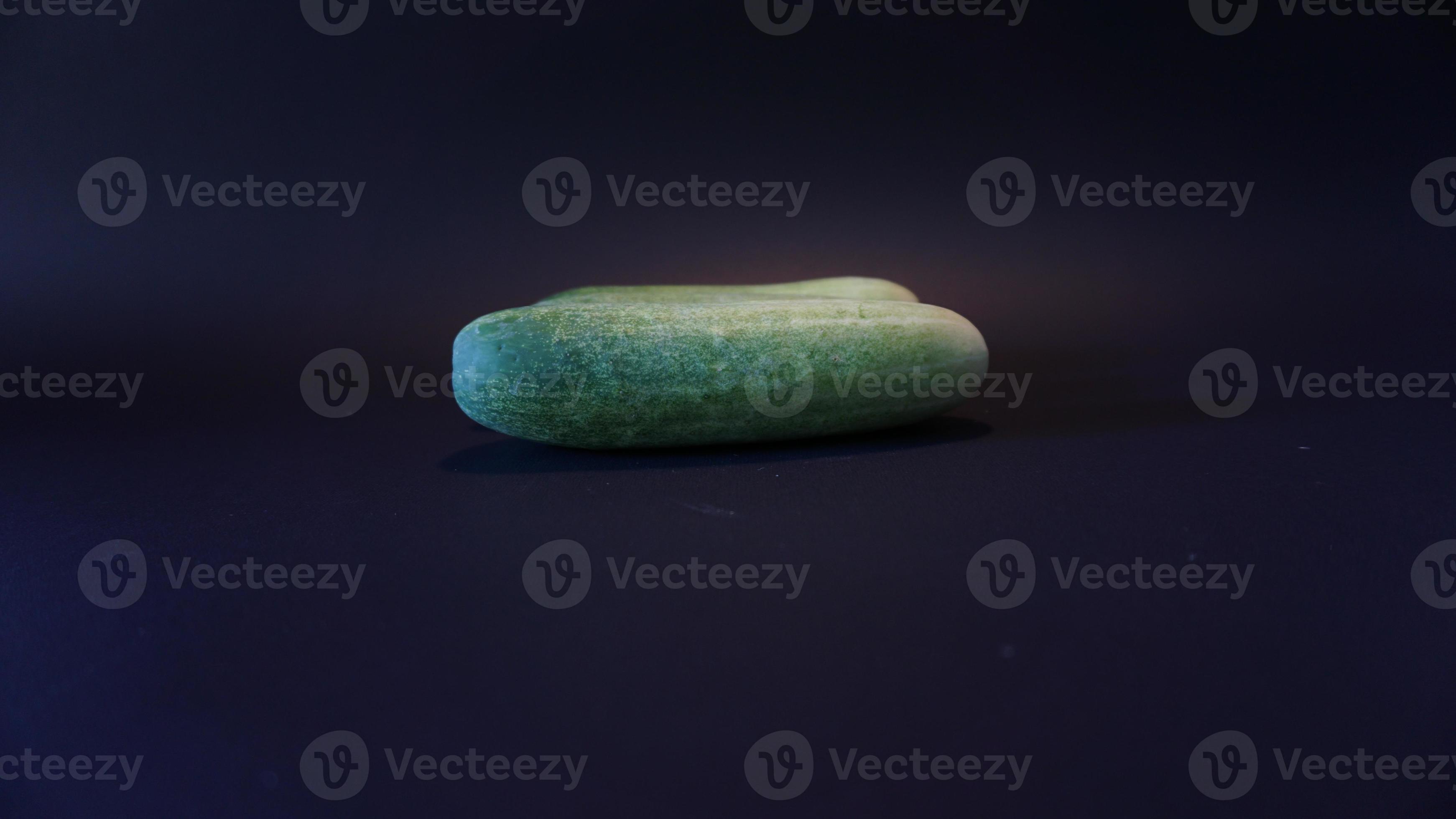 Fresh cucumber on black background. 18918606 Stock Photo at Vecteezy