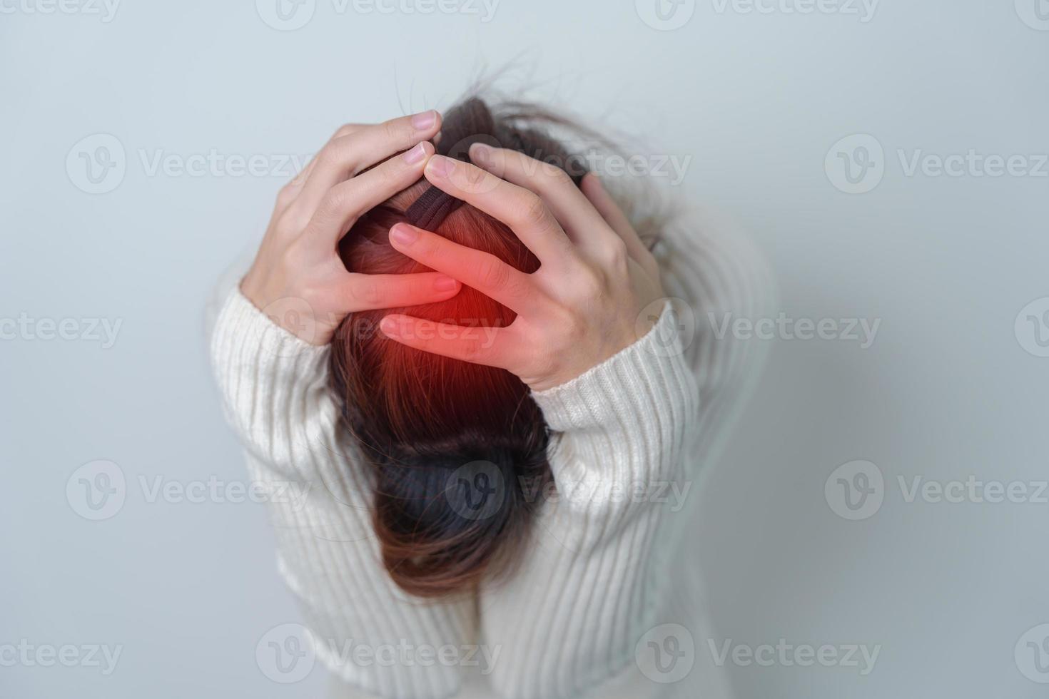 Woman having headache. stressed, Migraine, World Brain Tumor day, Brain Stroke, Dementia, alzheimer, parkinson and world mental health concept photo