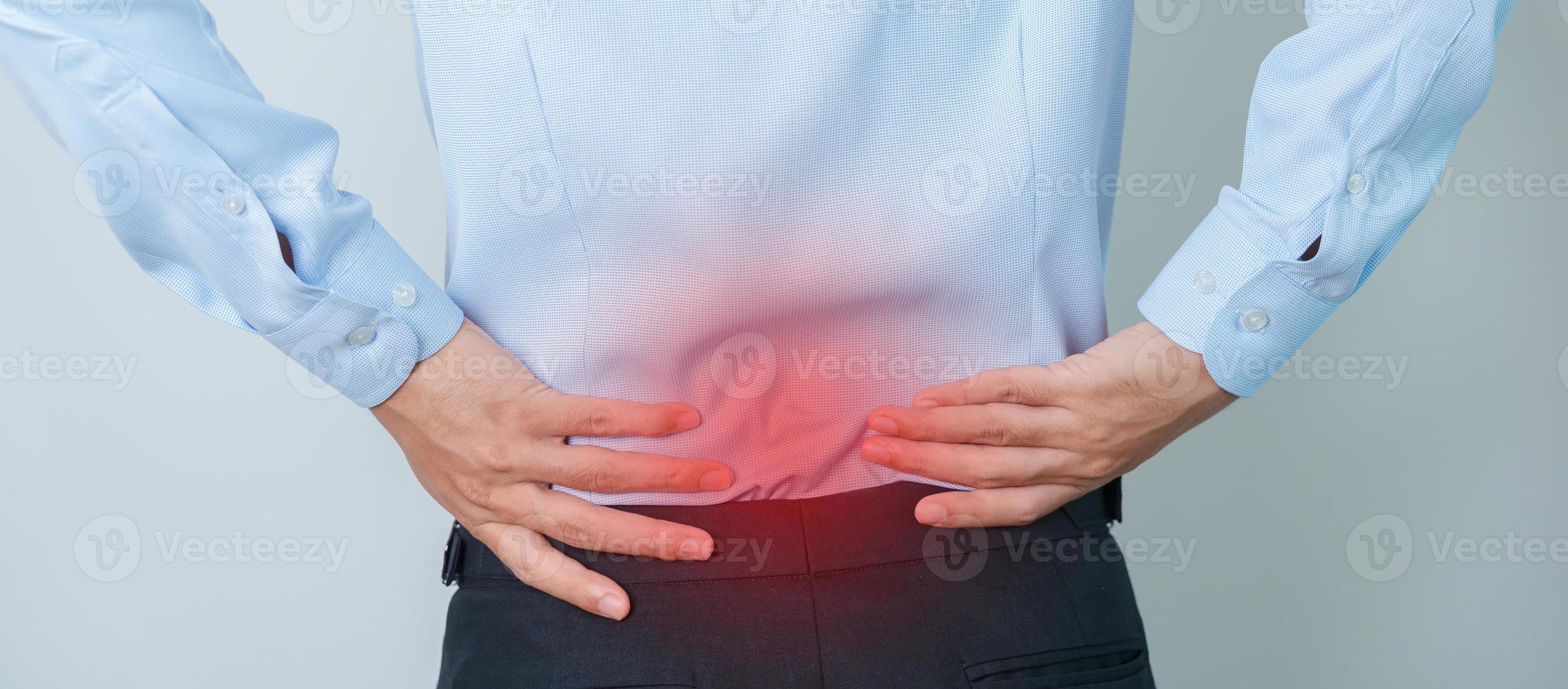 man having back pain. Urinary system and Stones, Cancer, world kidney day, Chronic kidney stomach, liver pain and pancreas concept photo