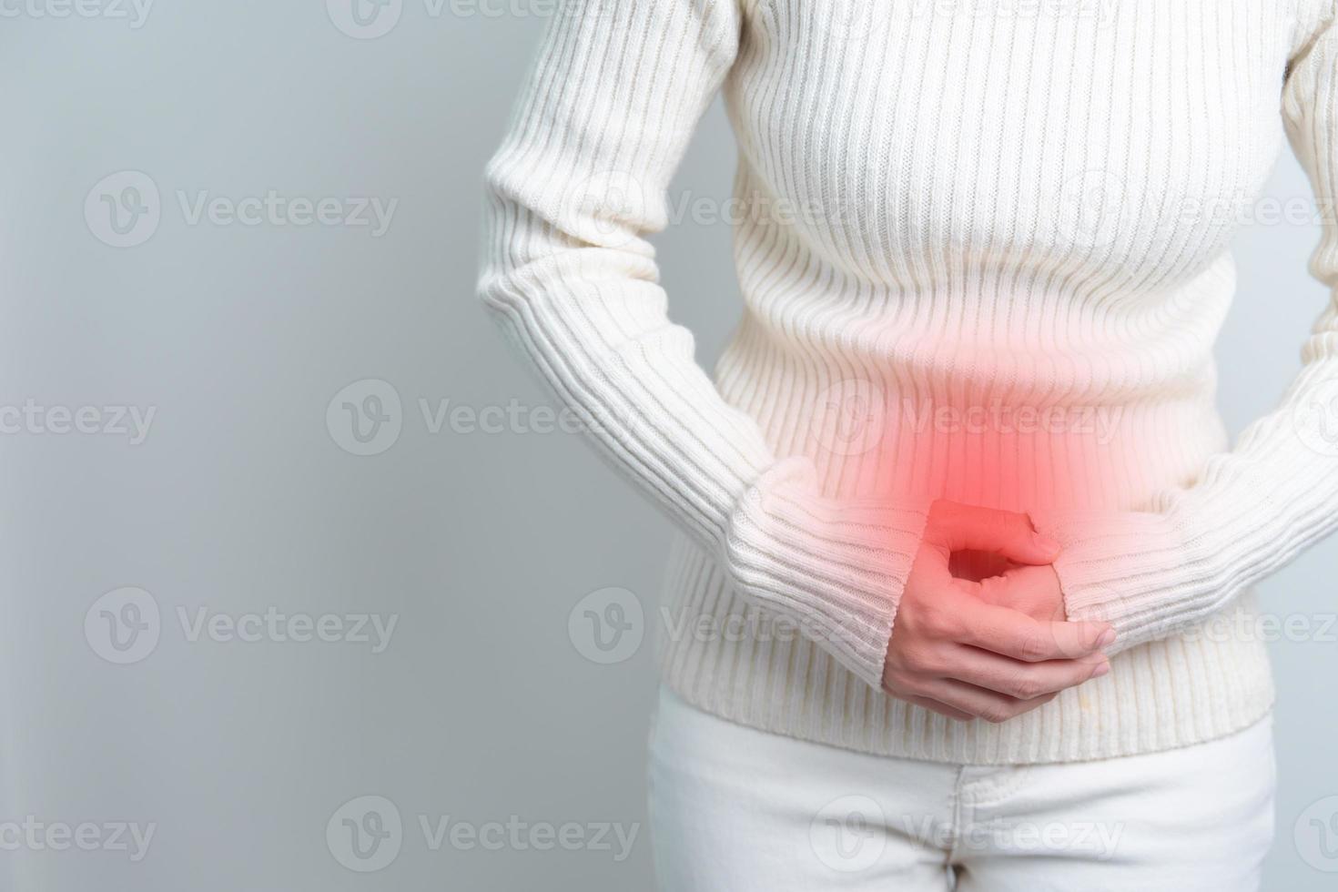Woman having Stomach pain. Ovarian and Cervical cancer, Cervix disorder, Endometriosis, Hysterectomy, Uterine fibroids, Reproductive system, menstruation, diarrhea and Pregnancy concept photo