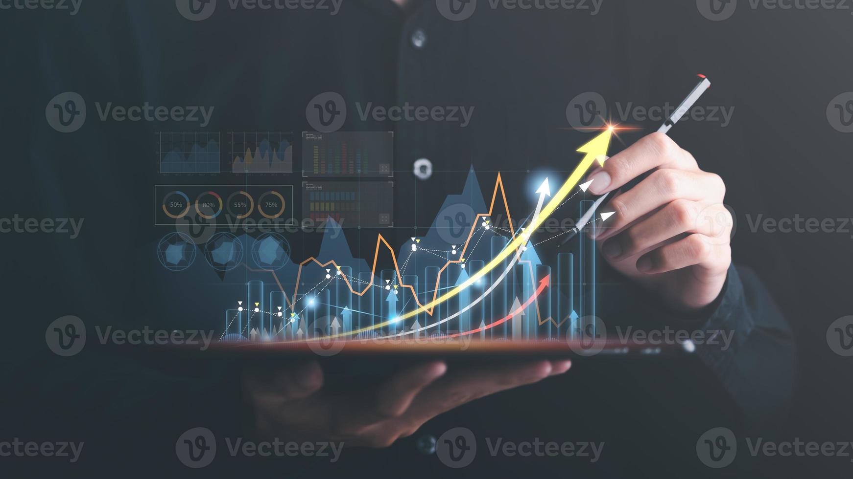 Businessman showing business growth and success graph ,concept of progress in development, financial efficiency and investment with business strategy for goals and opportunities in the industry future photo