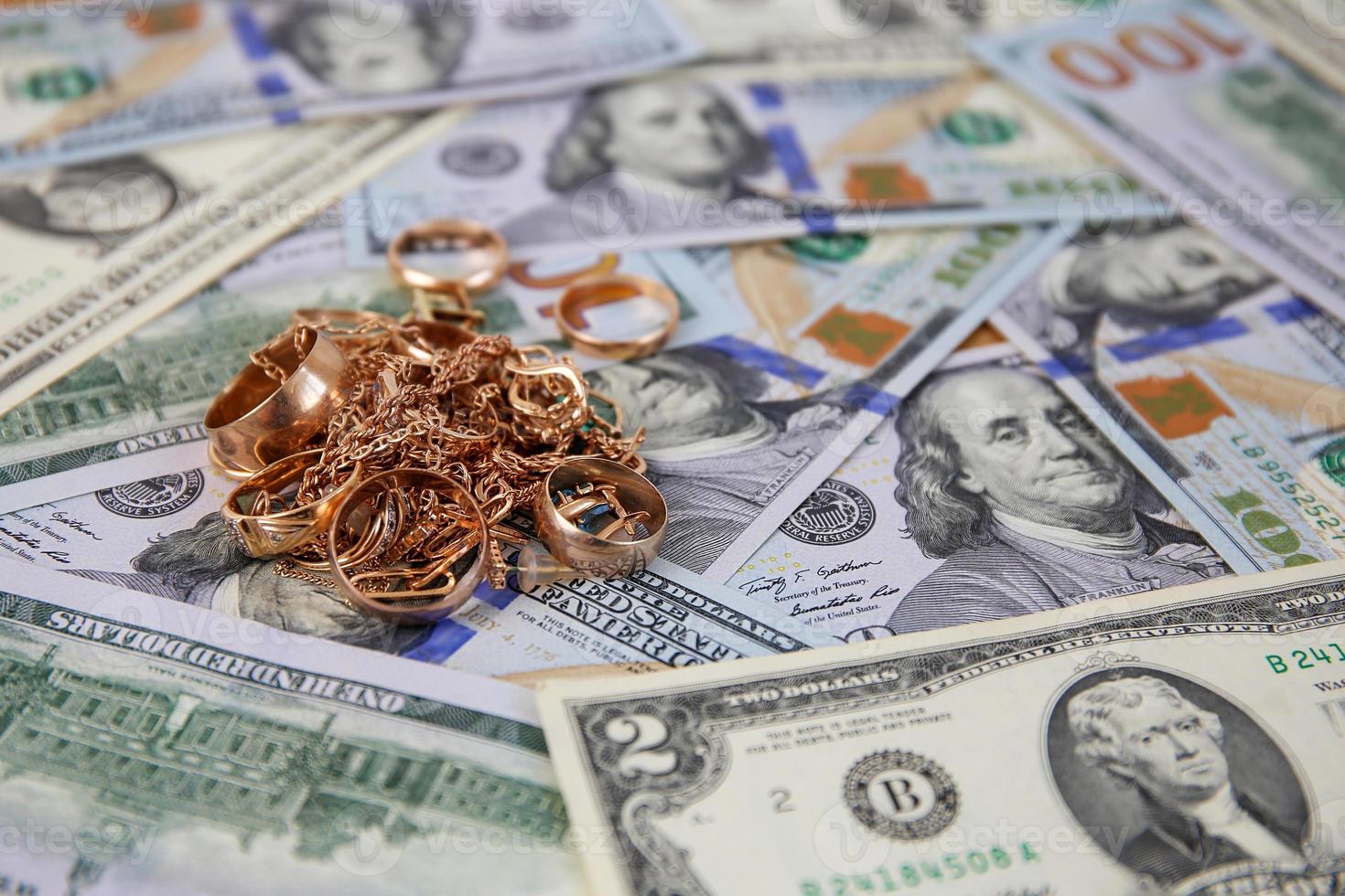 Jewelry on the background of American dollars. photo