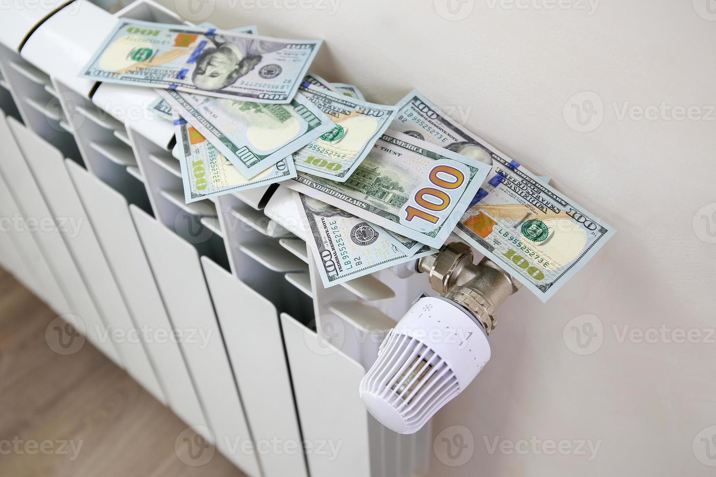 Radiator and money. The concept of payment for heating. photo