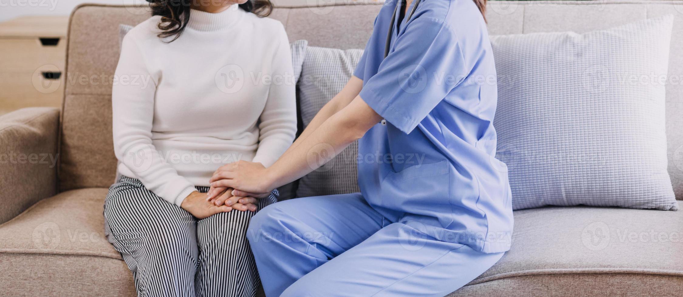 Homecare nursing service and elderly people cardiology healthcare. Close up of young hispanic female doctor nurse check mature caucasian man patient heartbeat using stethoscope during visit photo