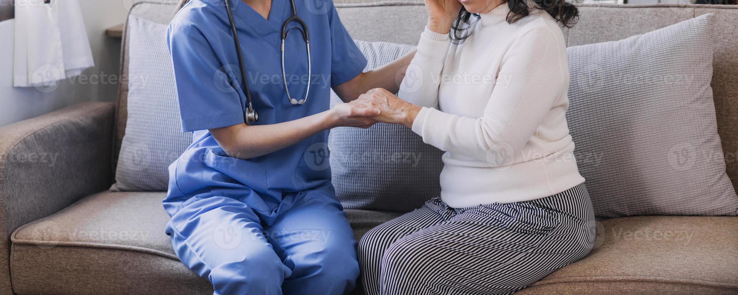 Homecare nursing service and elderly people cardiology healthcare. Close up of young hispanic female doctor nurse check mature caucasian man patient heartbeat using stethoscope during visit photo