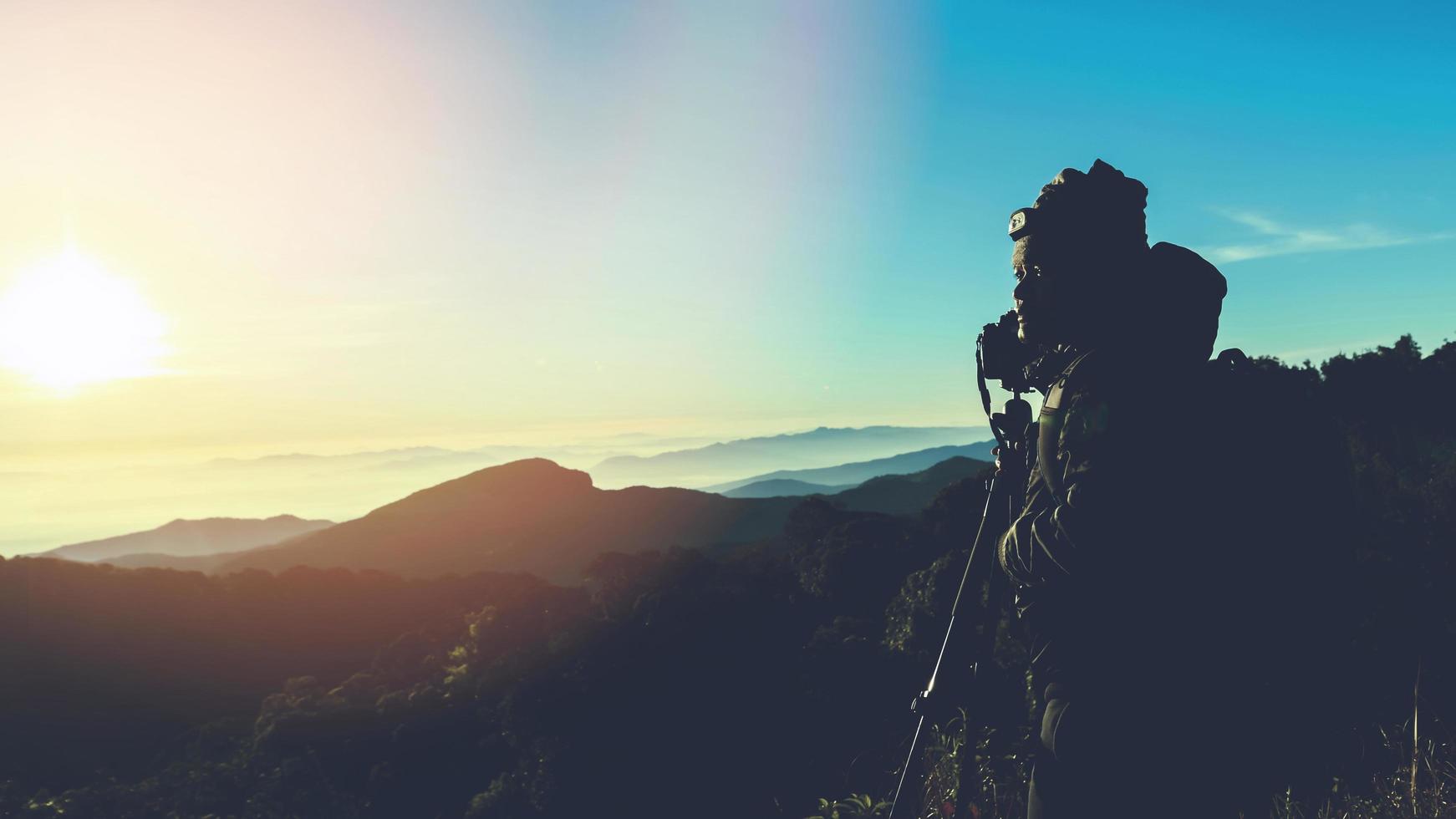 Photographer asian man travel nature. Travel relax. photo