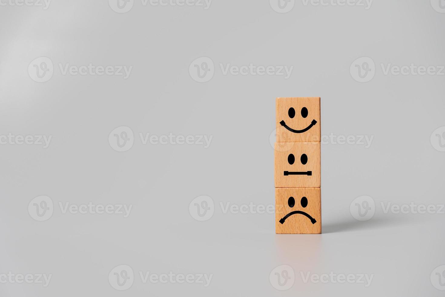 Concept of customer satisfaction review. Customer choose best rank with smiling face. photo