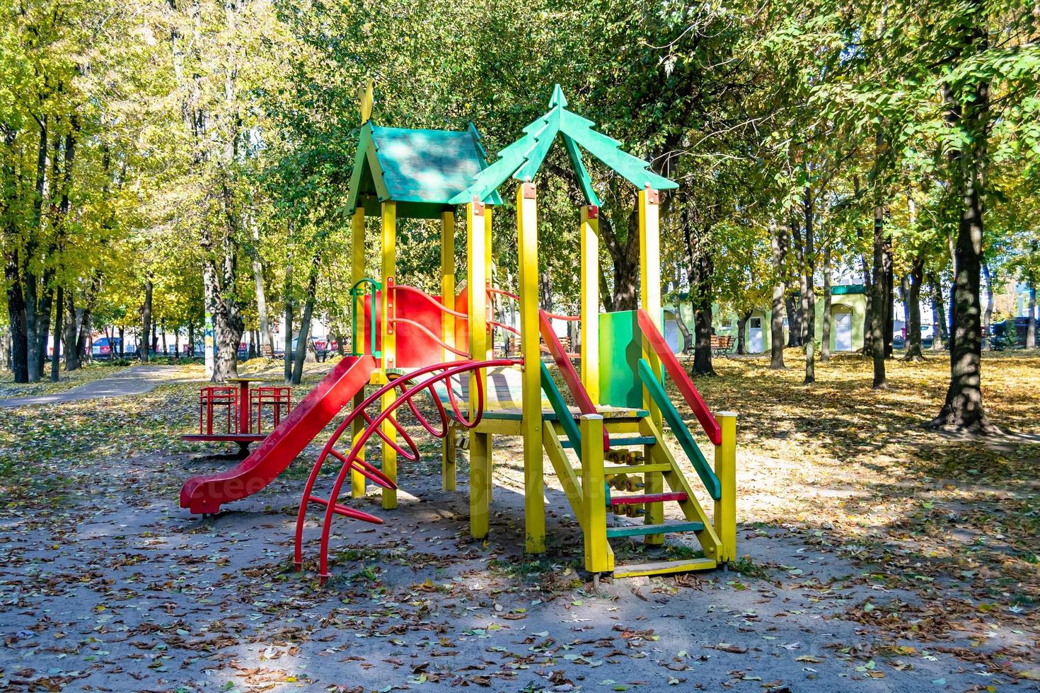 Photography on theme empty playground with metal slide for kids photo