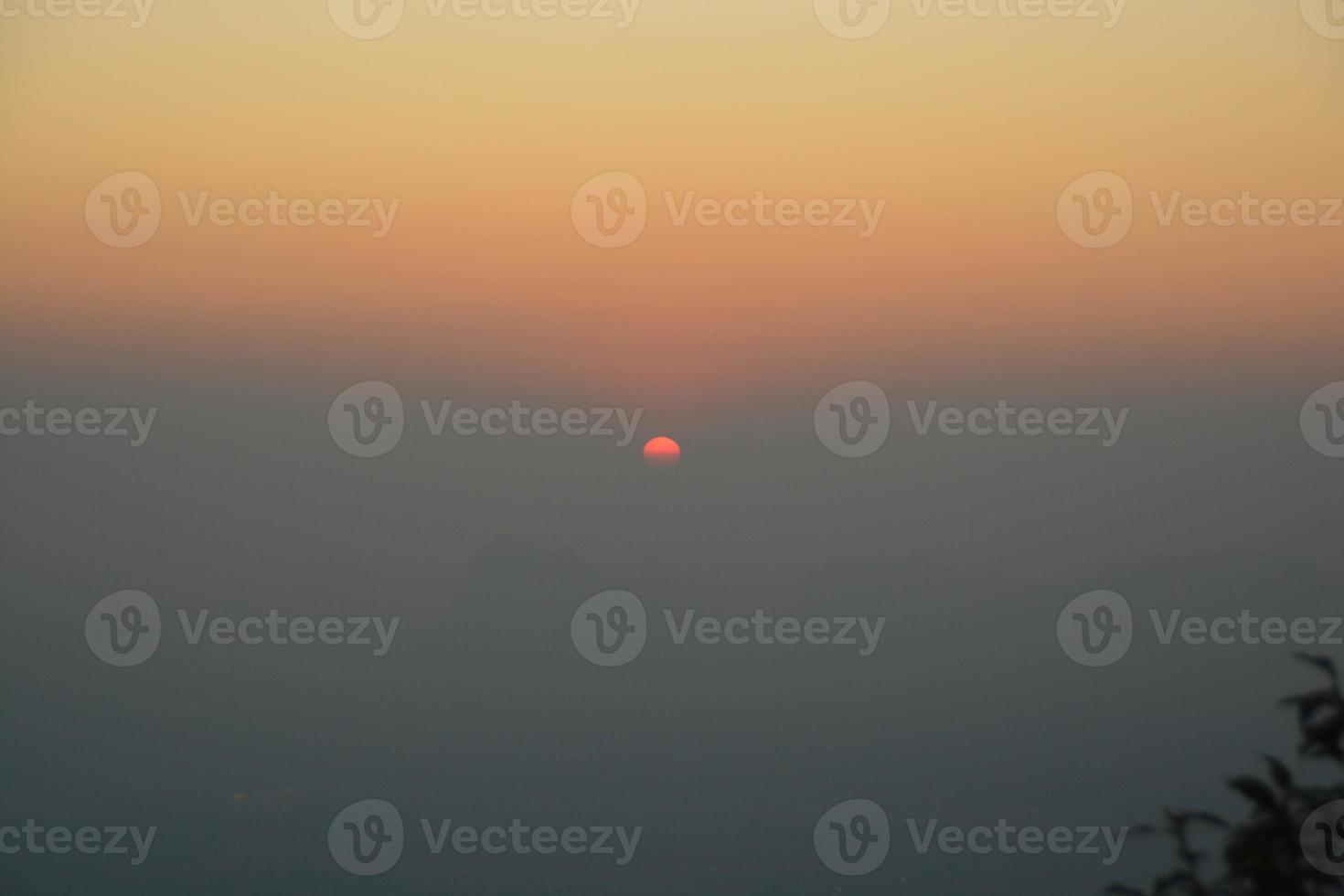 Beautiful sunrise time from Pha Nok Aen cliff of Phu kradueng national park, Thailand. photo