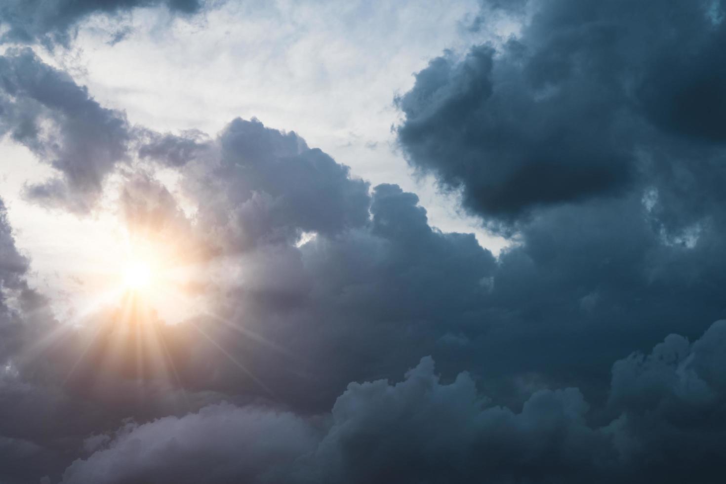 The sun is breaking through the clouds. photo
