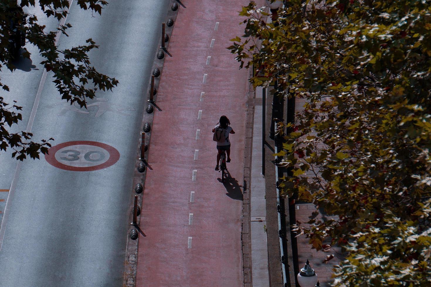 Bilbao, Vizcaya, Spain, 2023 -  cyclist on the street, bicycle mode of transport photo