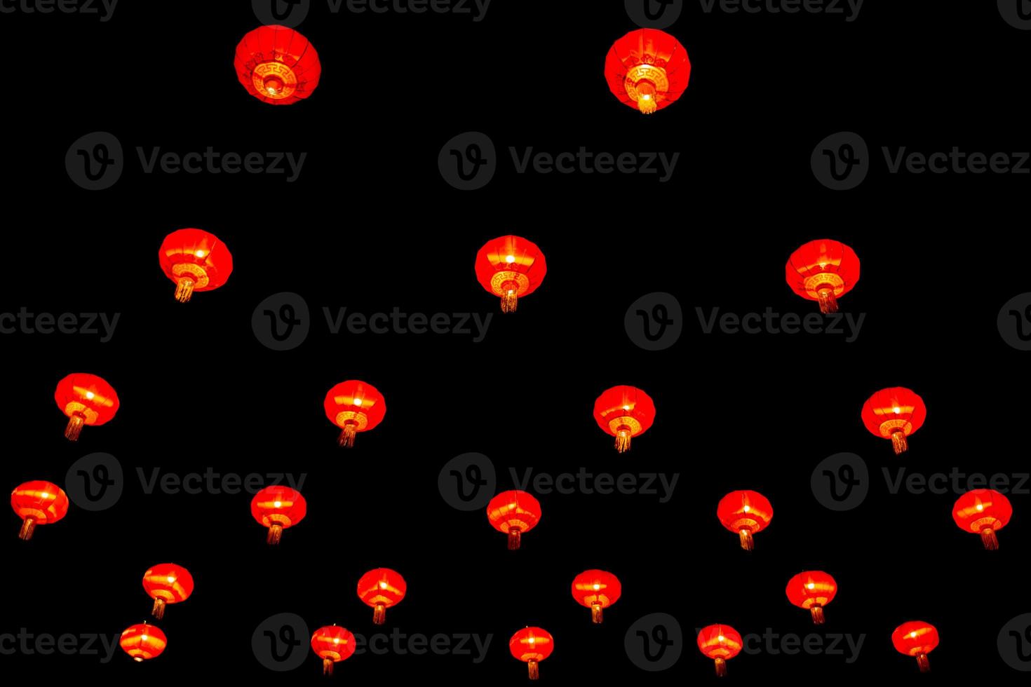 Chinese lantern in new year festival, red lanterns are hung as pattern,black background,Chinese new year concept. photo