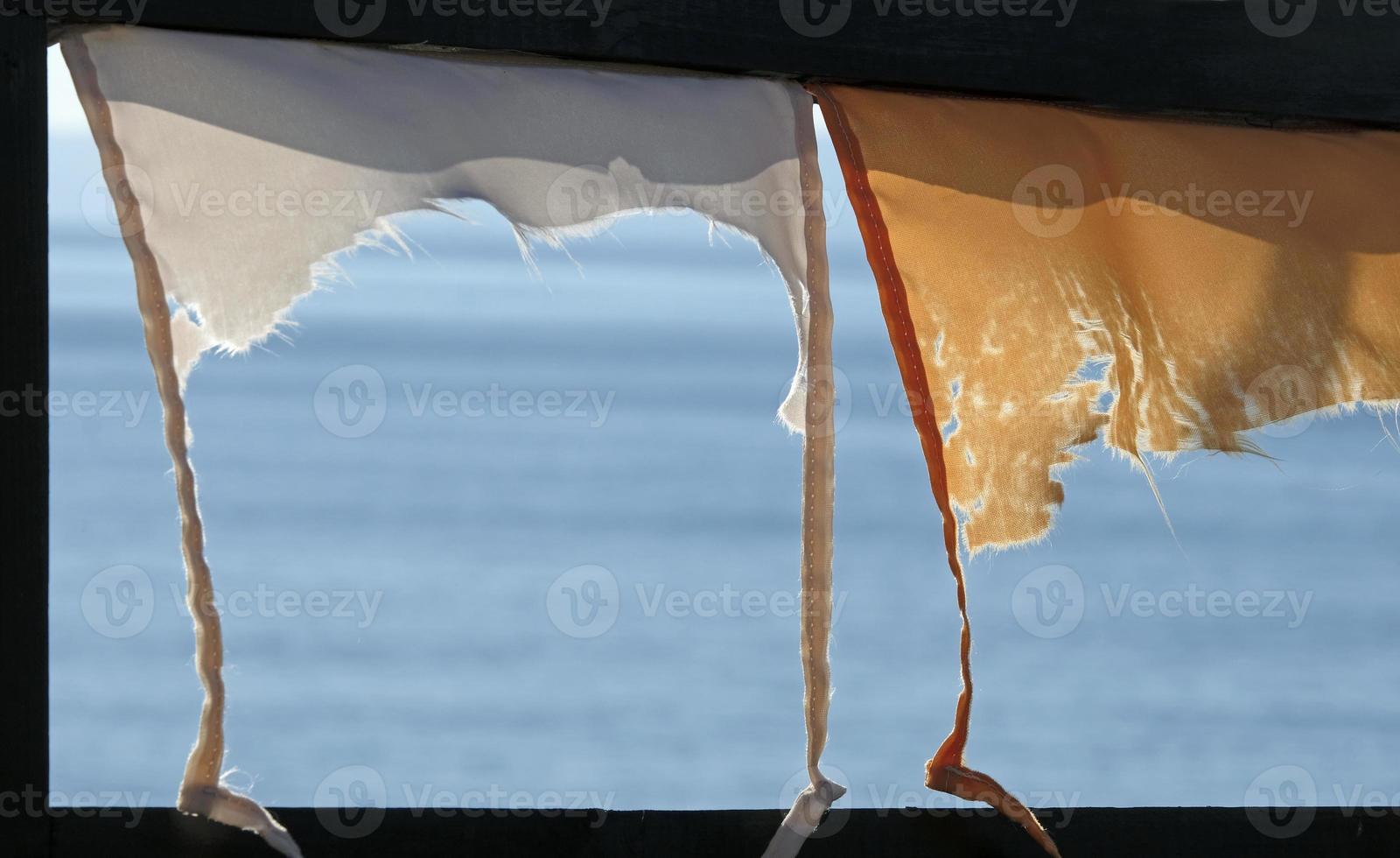 Ocean view through a windowless frame at the Japanese coast photo