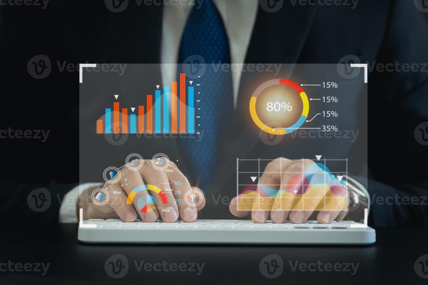 Business man wearing suit working on laptop and  to smart digital marketing on virtual screen, Analyzes the working with digital reality graphics. Business technology graph analysis concept. photo