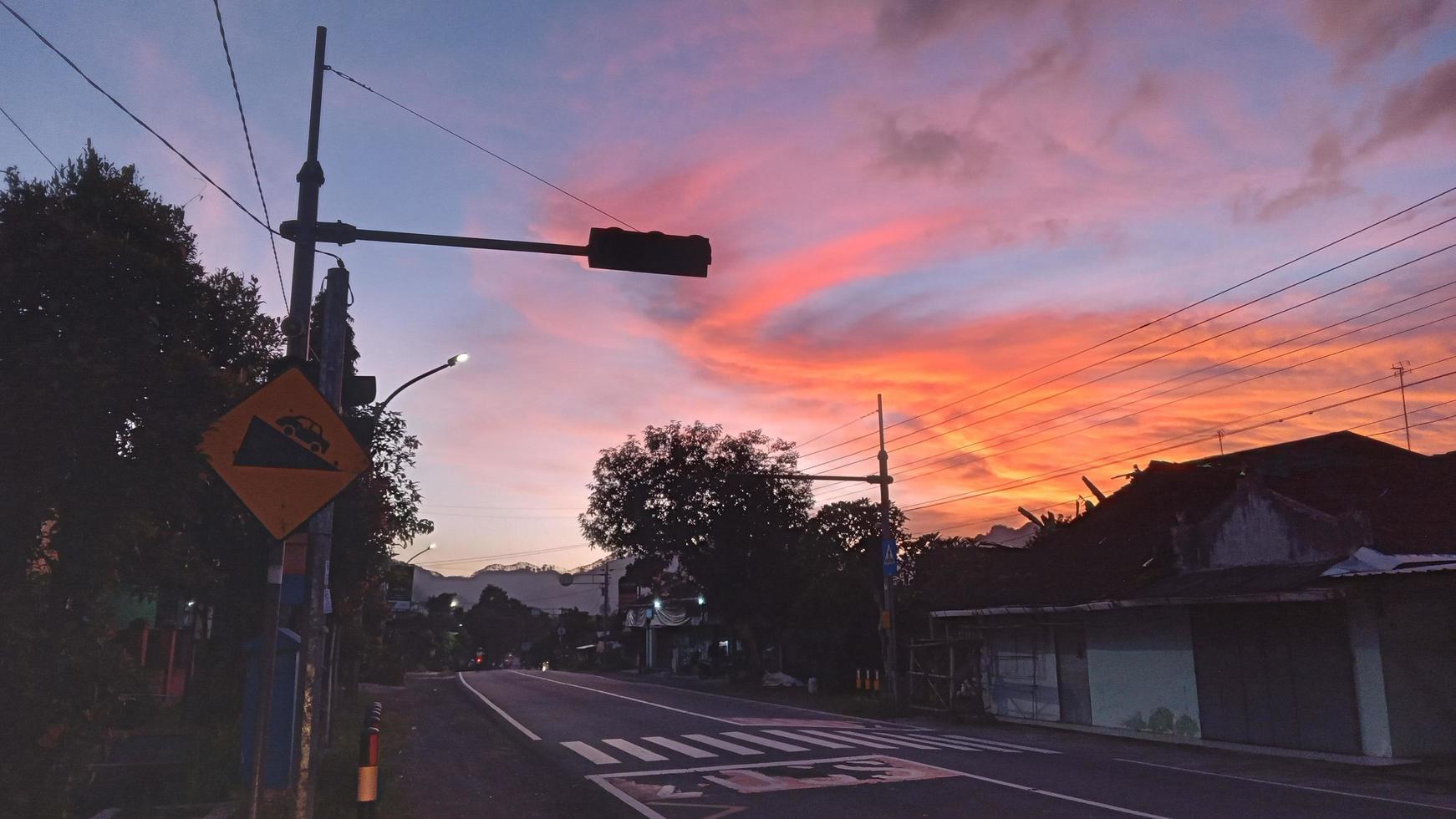 Sunset view in Magelang indonesia with the road photo