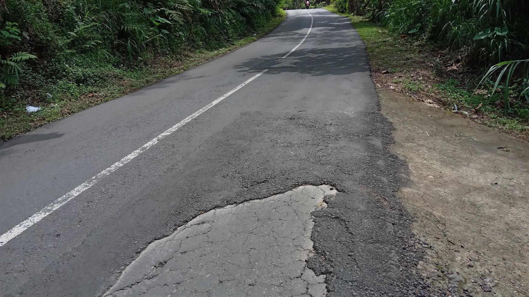 Bad road in Indonesia photo