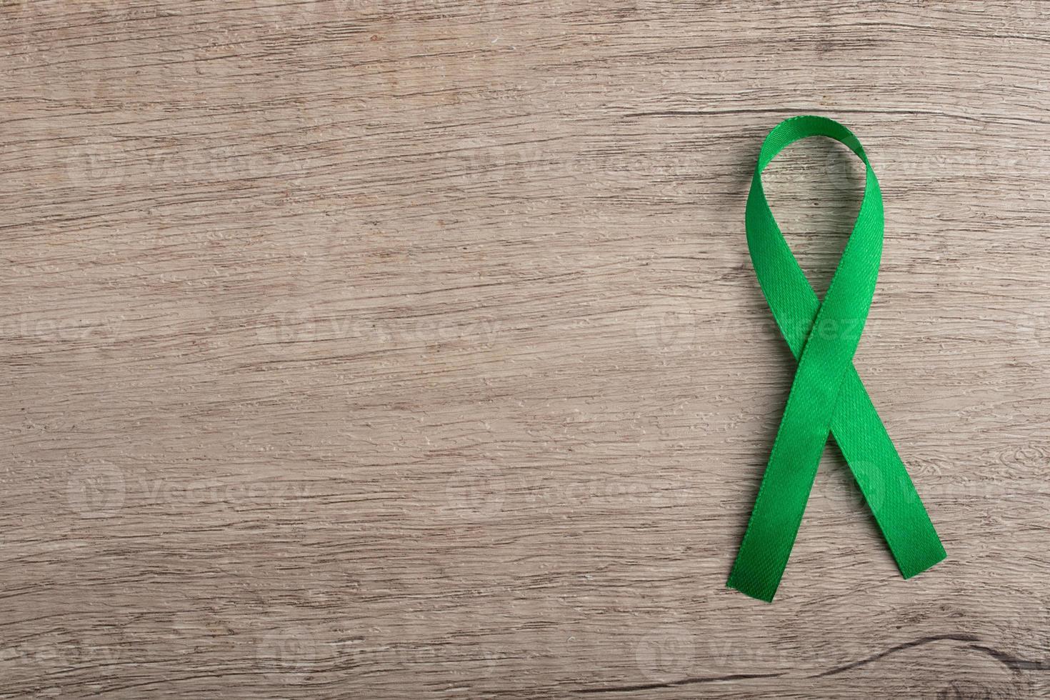 Cancer symbol green ribbon for copy space photo