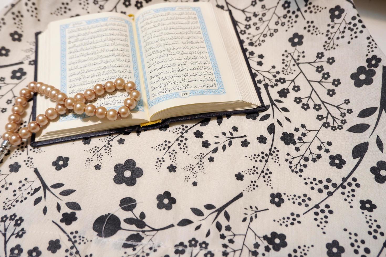 The Holy Quran with a floral motif photo