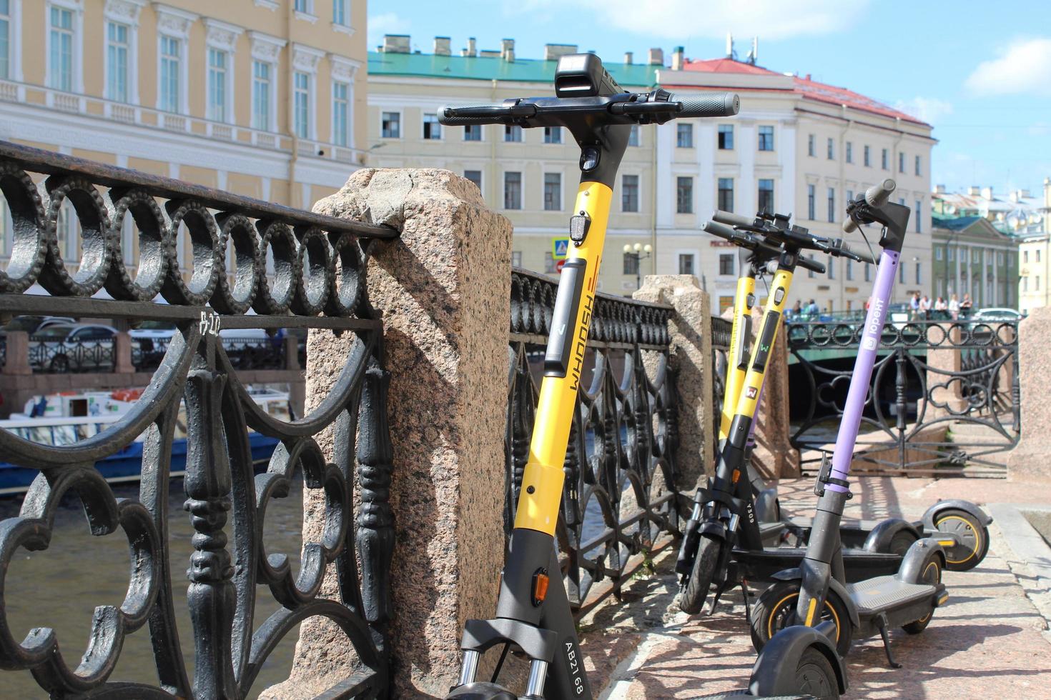 Sankt Petersburg Russia, 06 07 2022 Electric scooters lime dott bolt jawls wind ride segway e-scooter for urban mobility scooter parked in place reserved photo