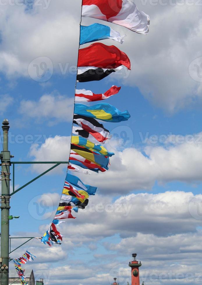 flags on blue sky background photo