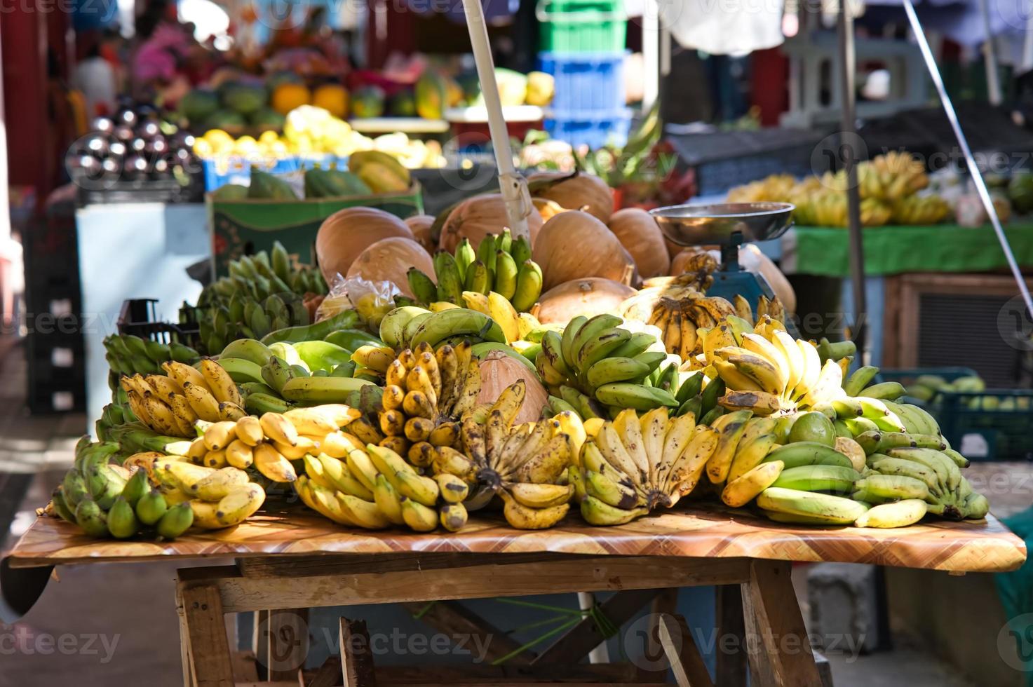 Mahe Seychelles, Sir Welwyn Clarke market in town, banana and pumpkin on the stands photo