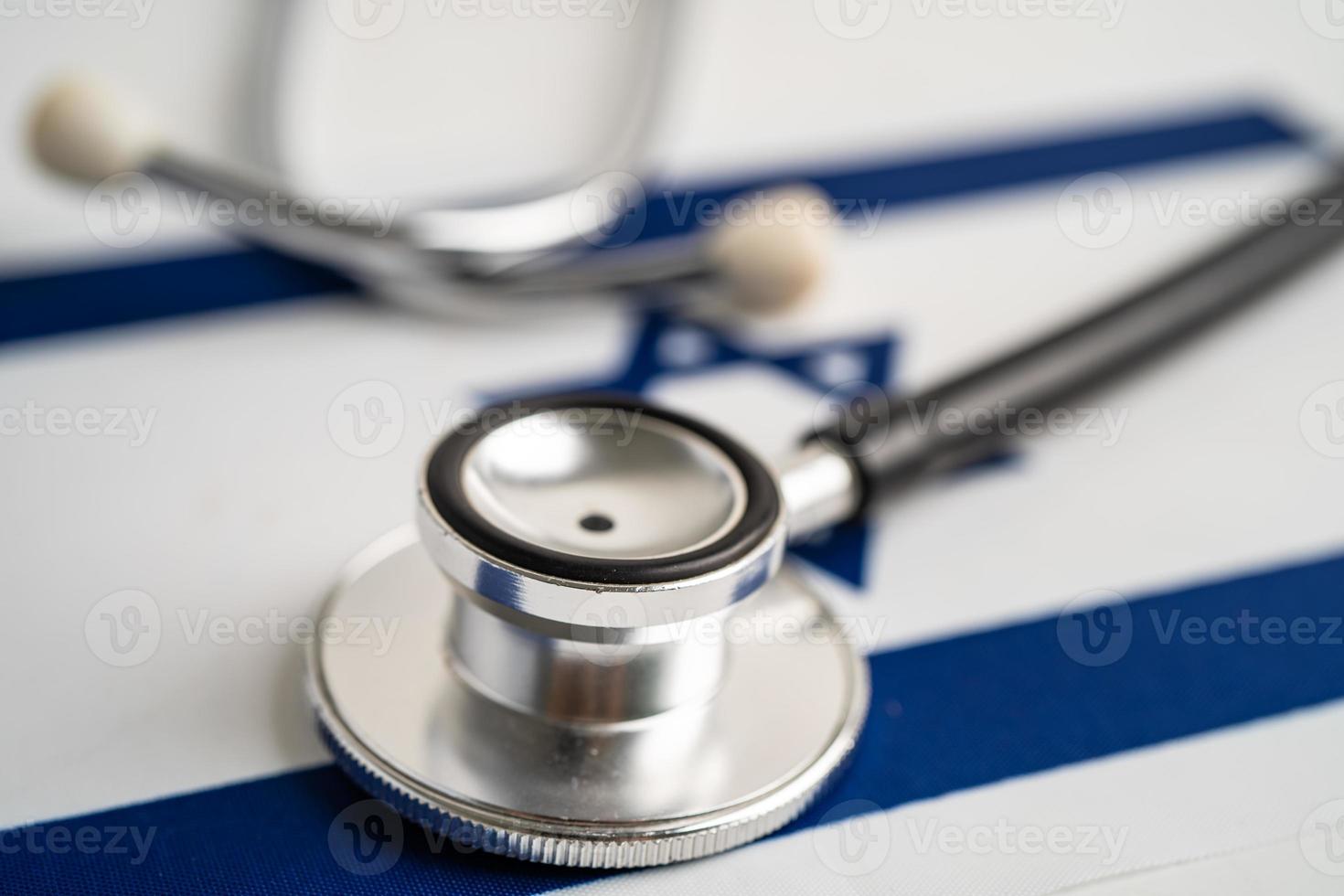 Black stethoscope on Israel flag background, Business and finance concept. photo