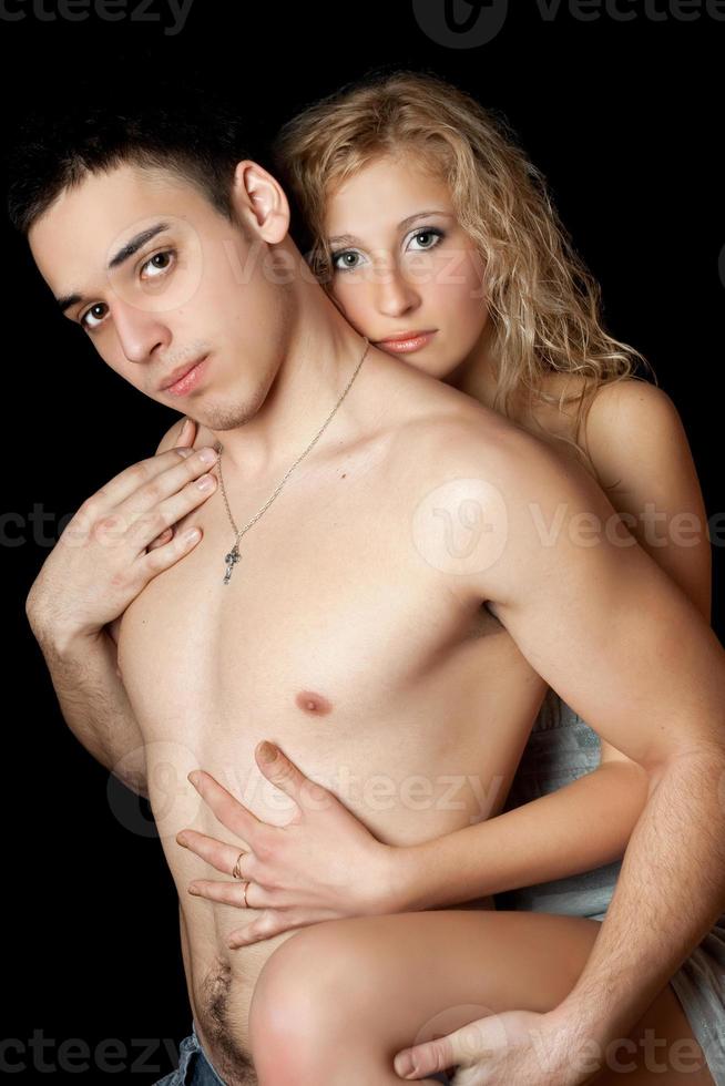 Attractive loving young couple. Isolated photo