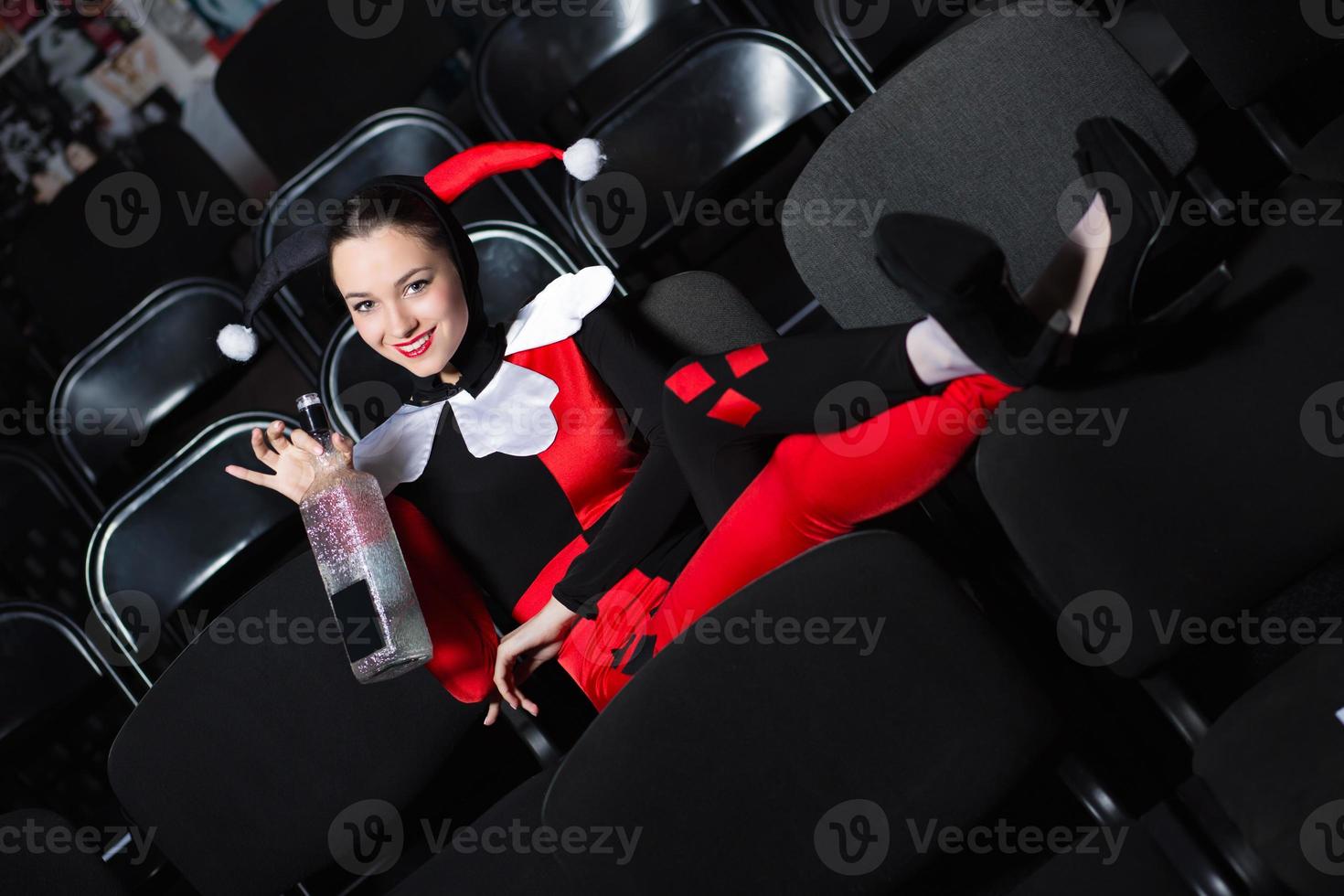 Playful woman wearing jester photo